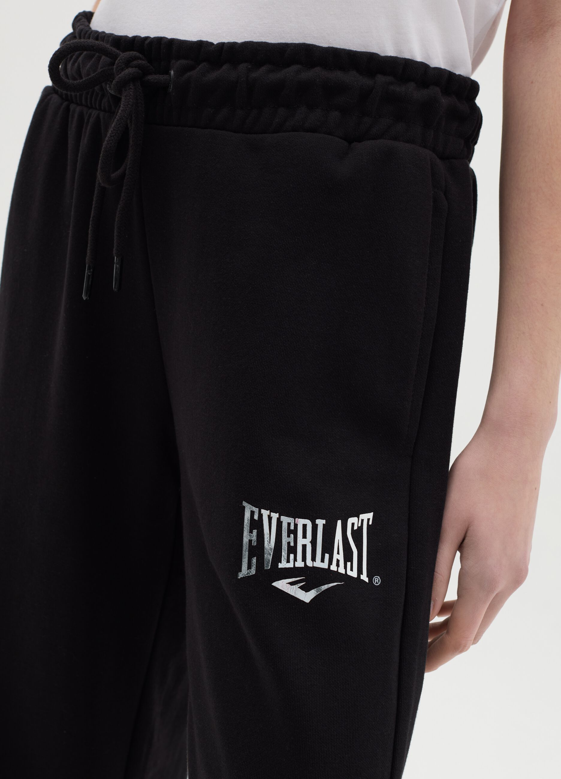 Joggers neri a campana con coulisse e stampa logo