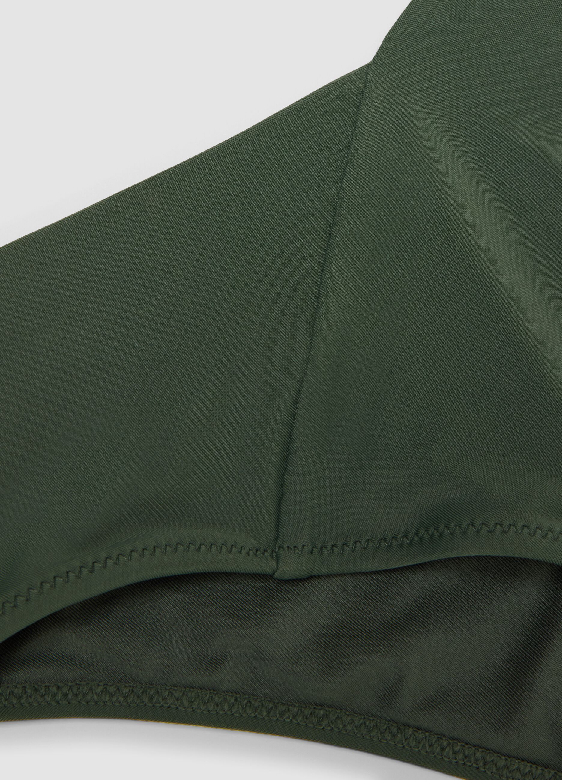 High-waisted green stretch bikini bottoms