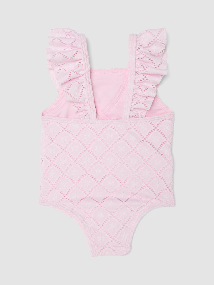 Pink ruffle swimsuit in stretchy fabric_1