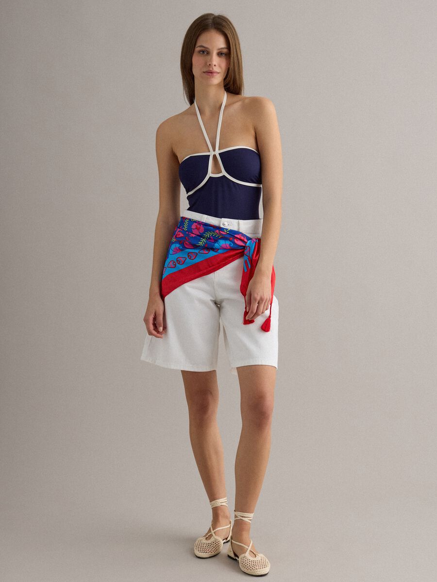 Blue stretch swimsuit with white piping_1