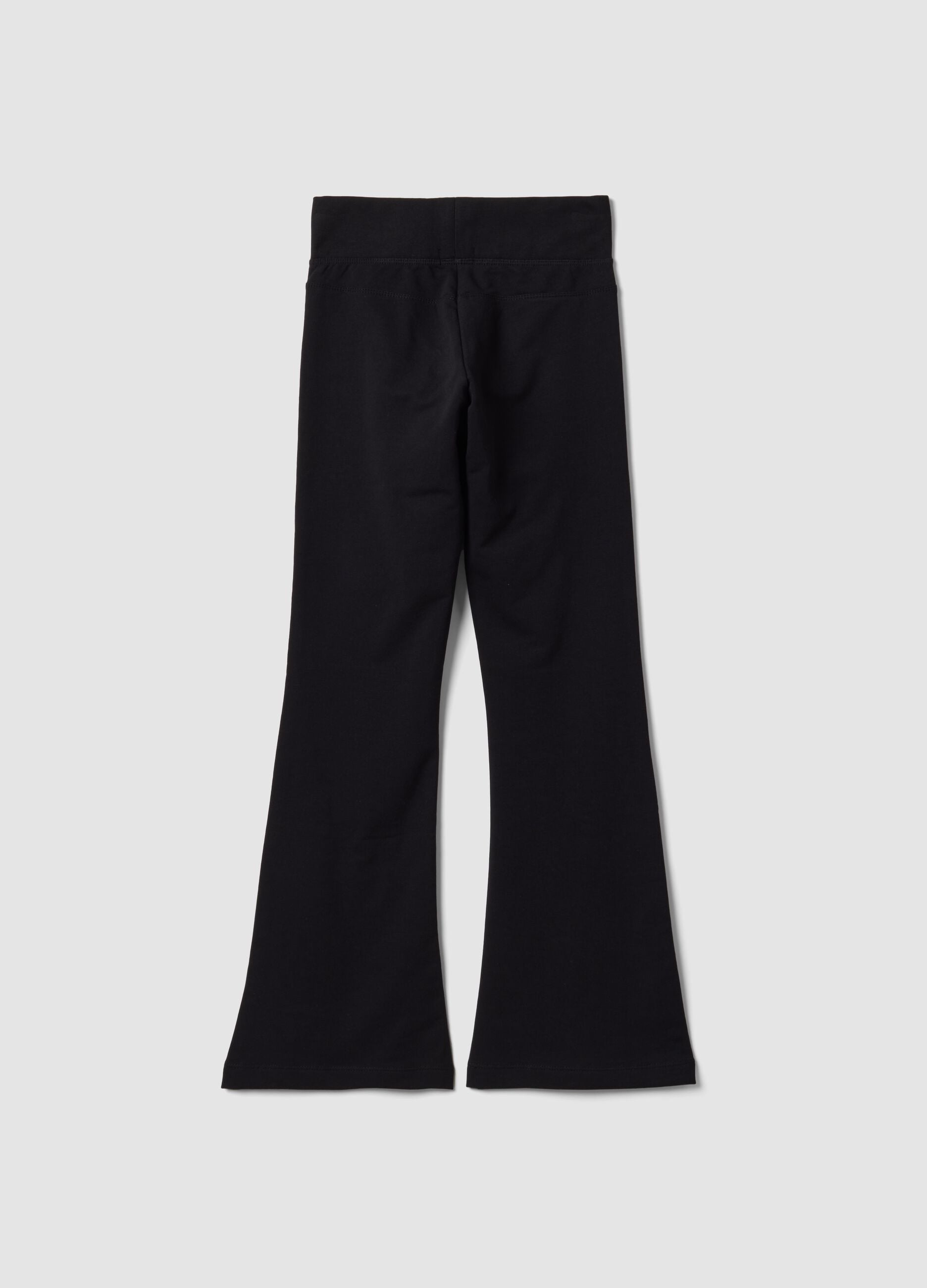 Black flared stretch organic cotton trousers for girls