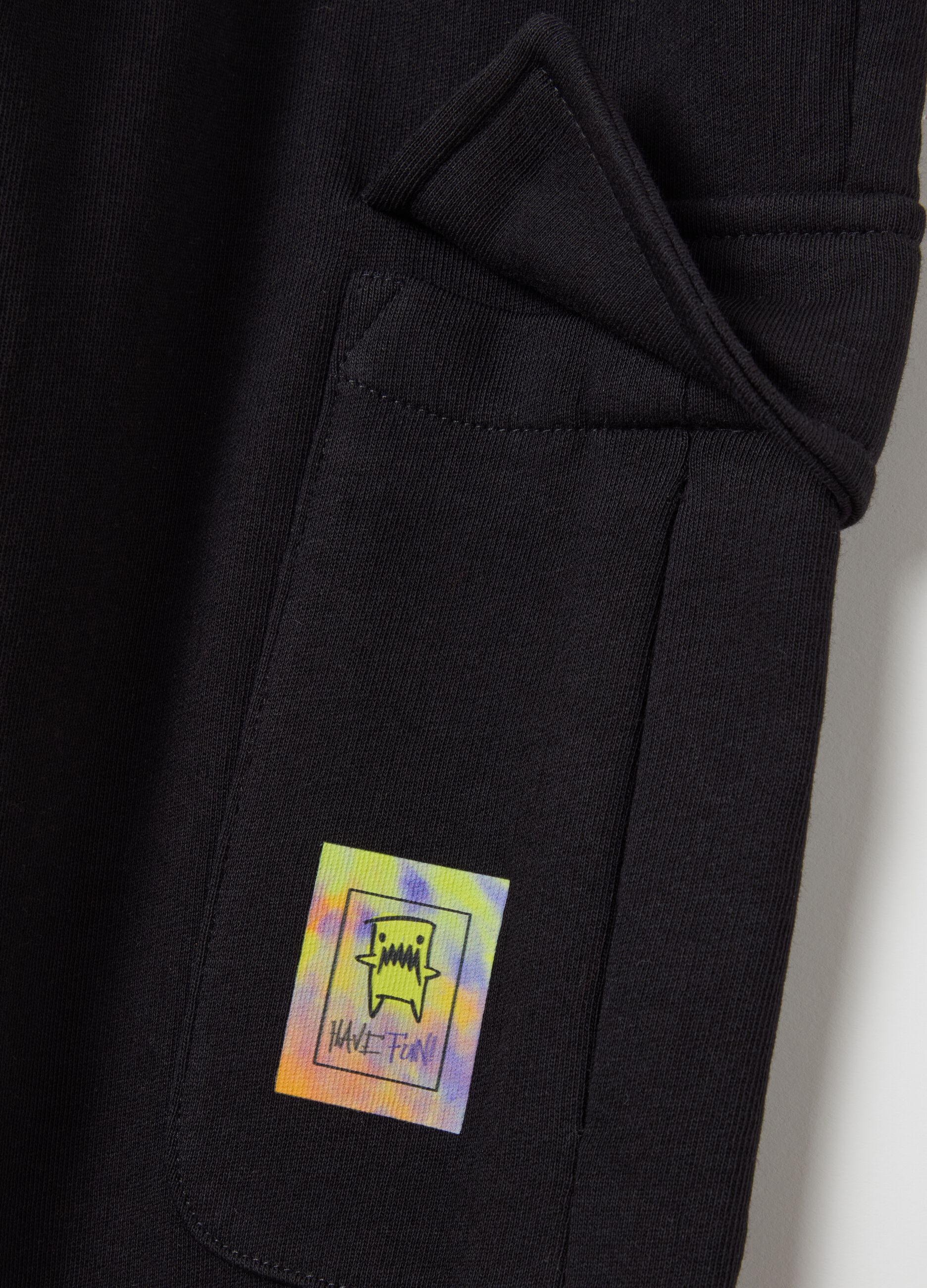 Cargo joggers with drawstring and monsters print
