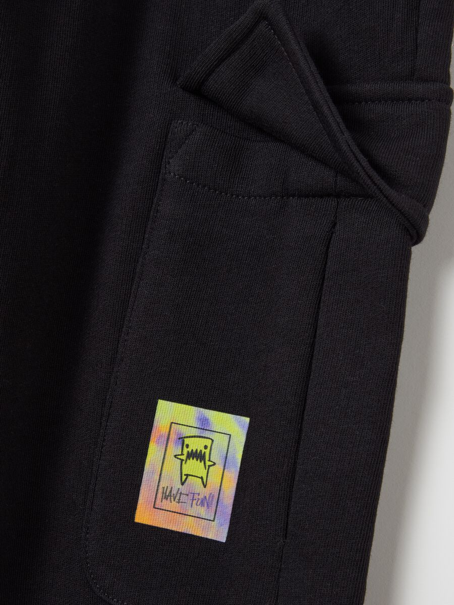 Cargo joggers with drawstring and monsters print_2