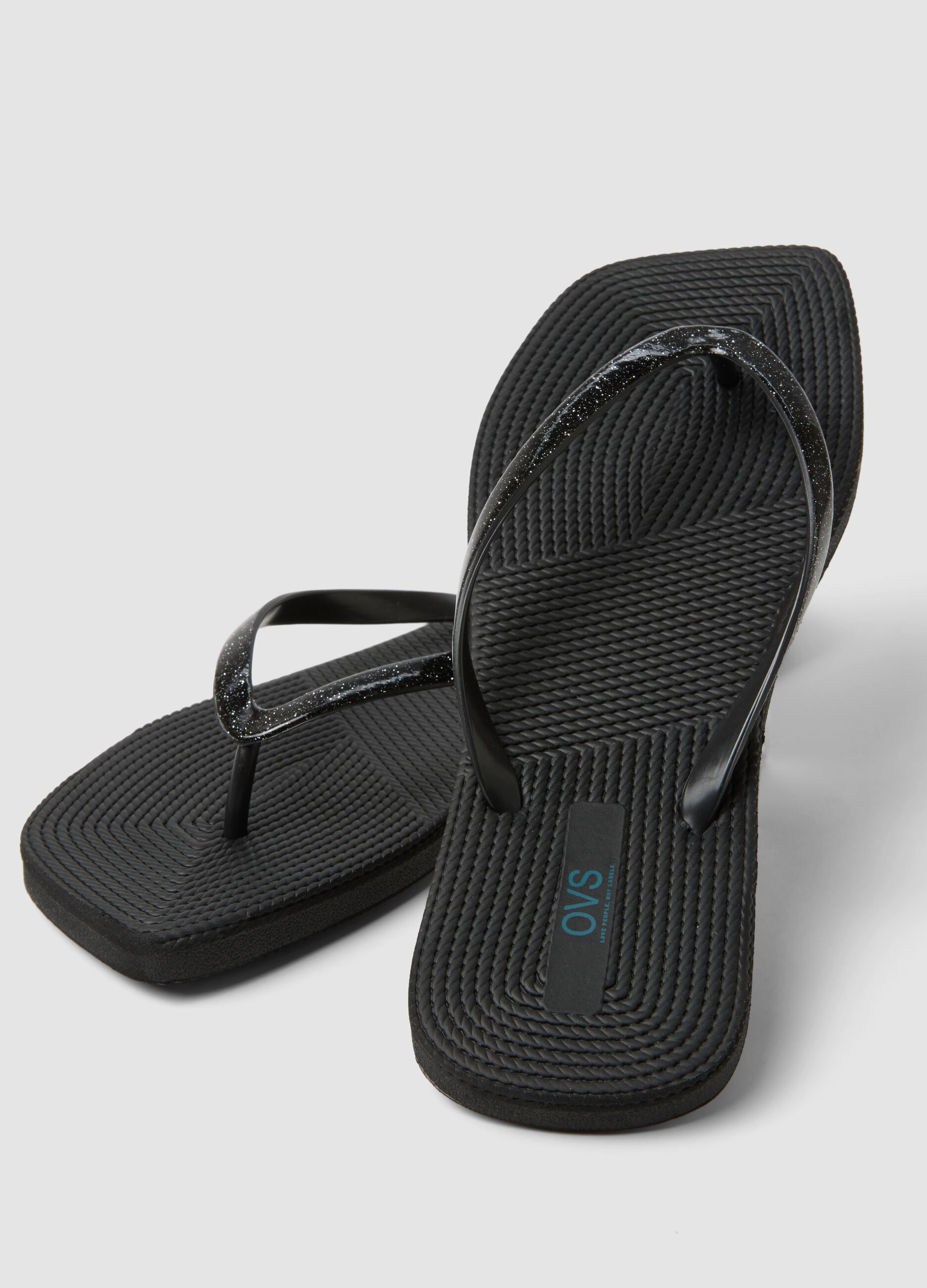 Black flip-flops with glitter straps