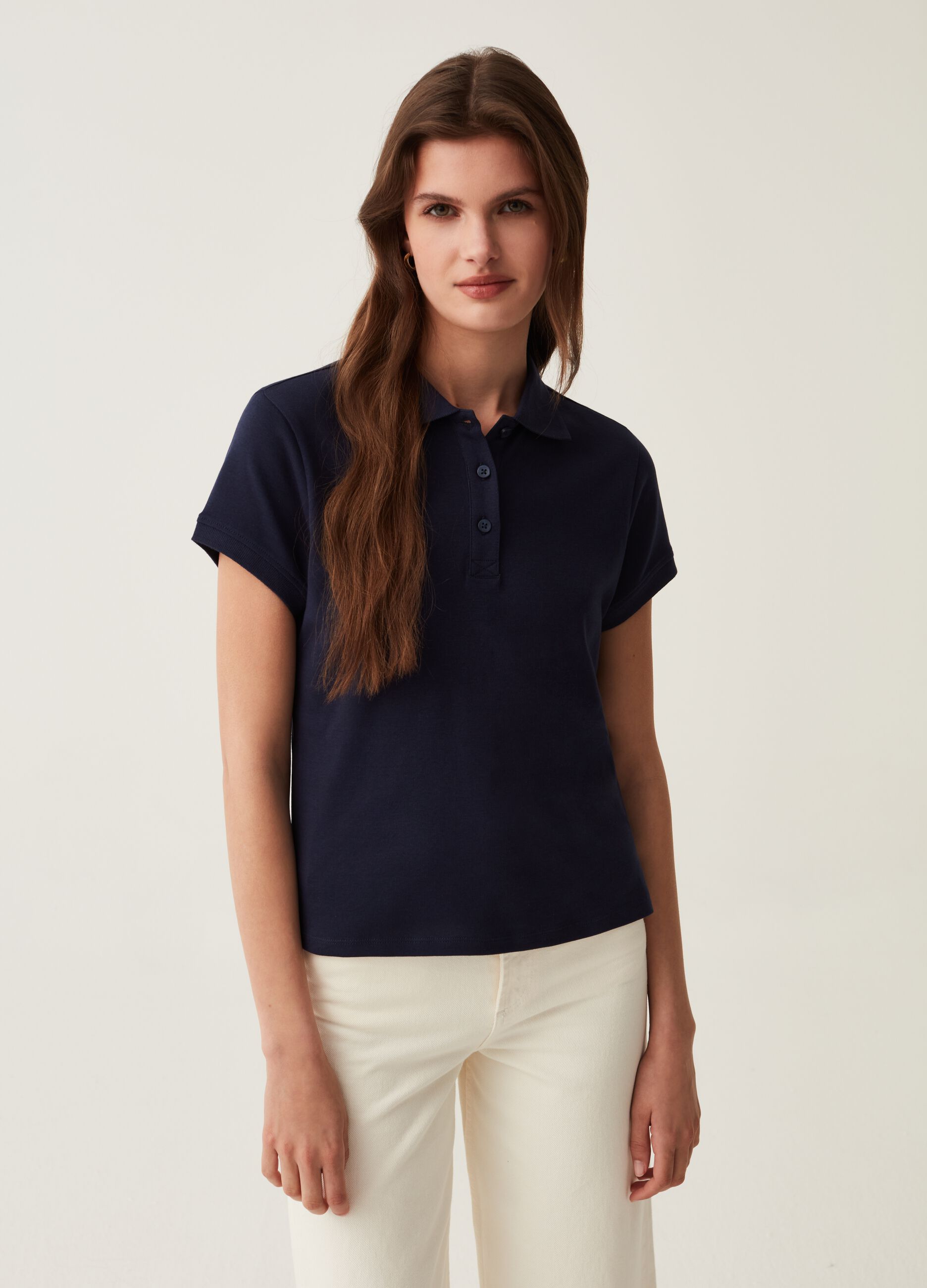 Solid colour cotton polo shirt