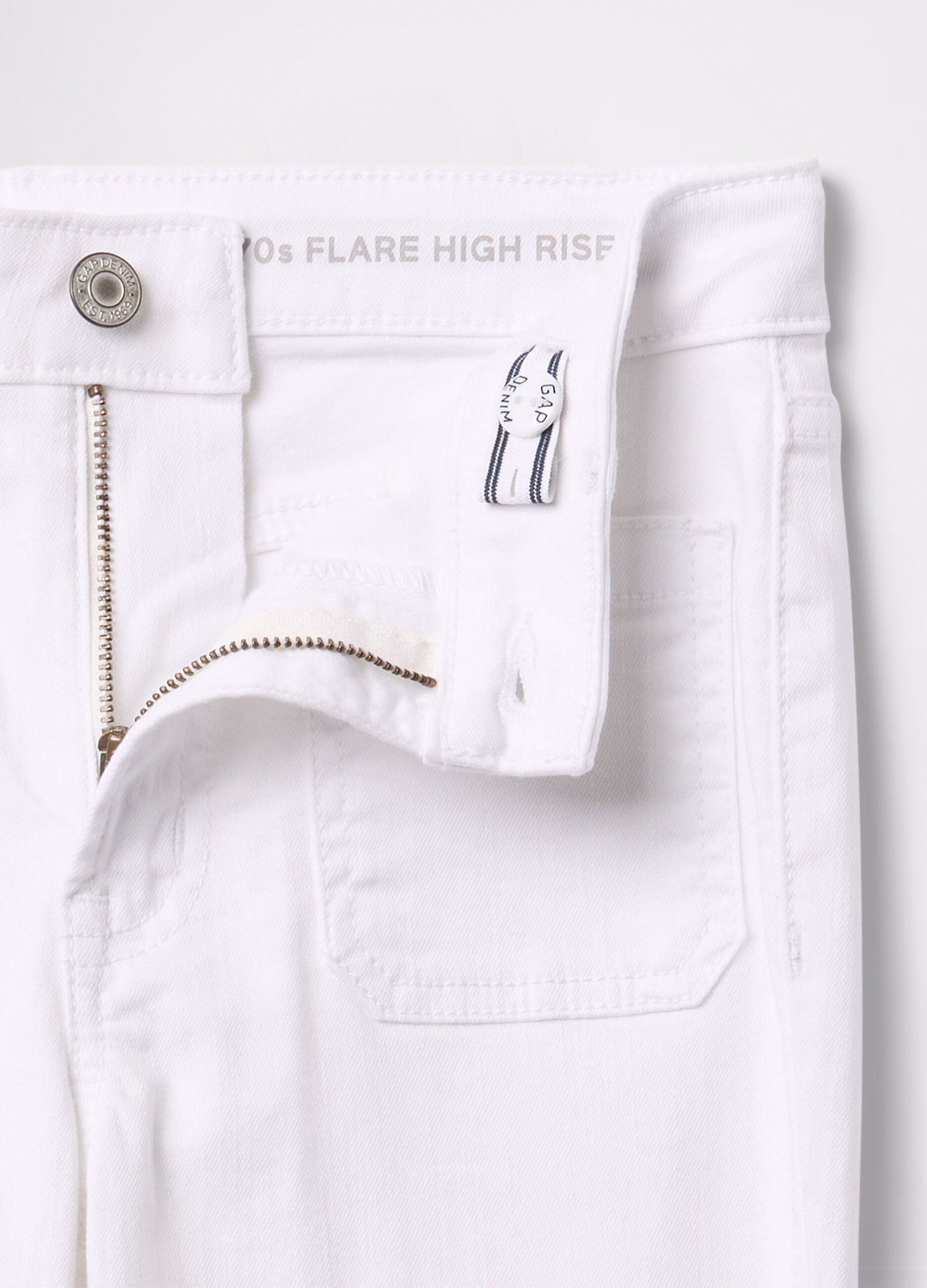 White flared jeans