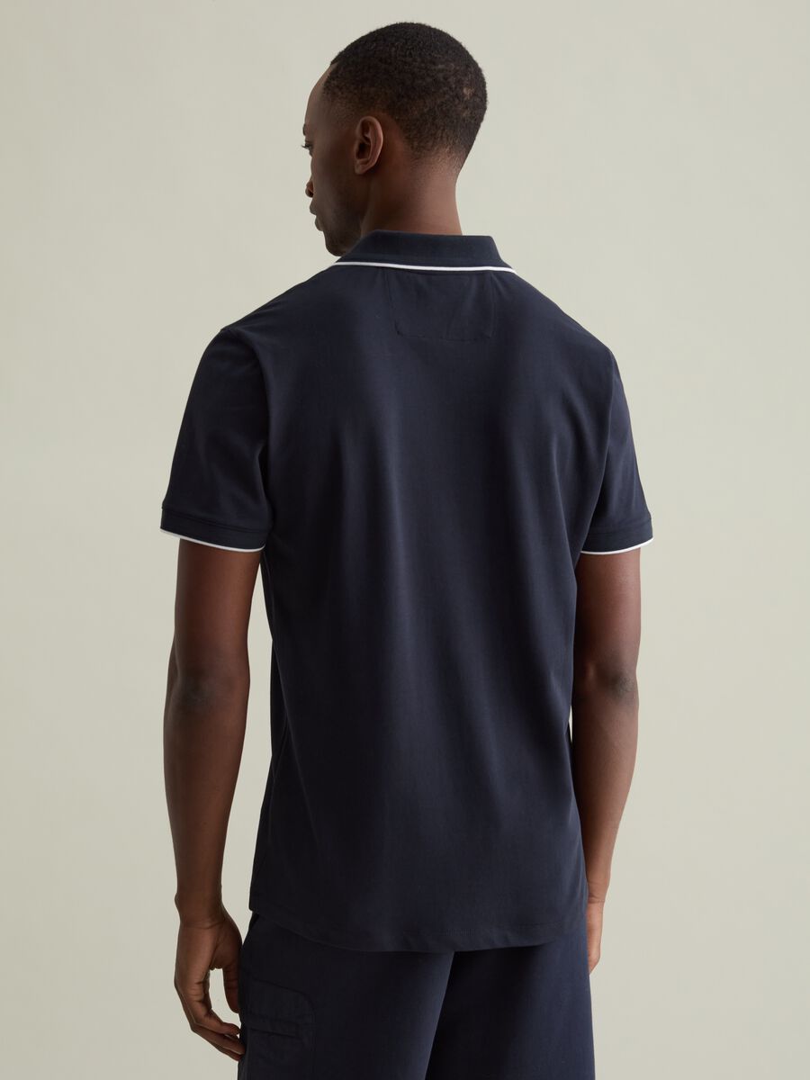 Polo shirt in technical fabric with contrasting edging_3