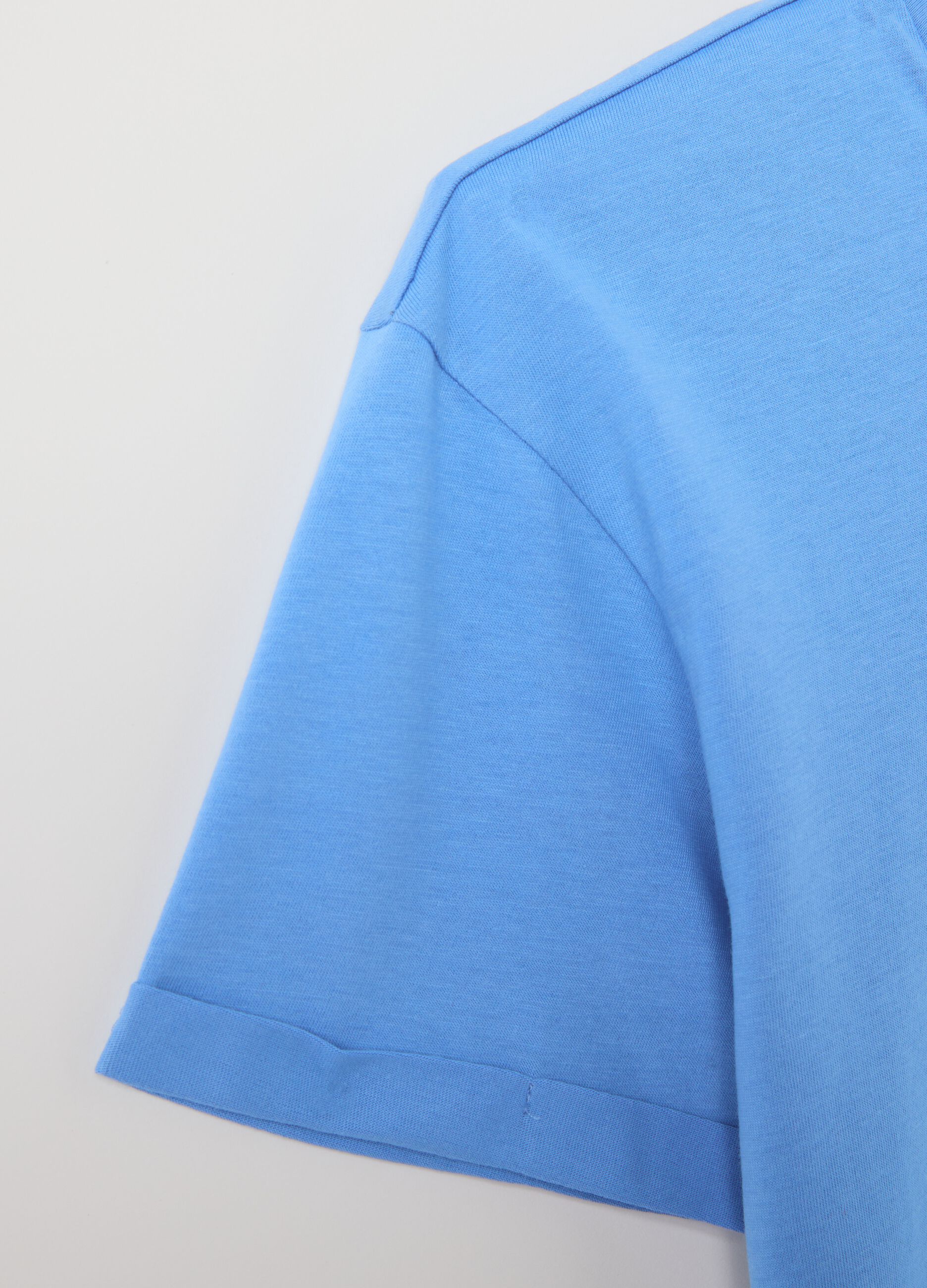White and light blue cotton pyjamas with print
