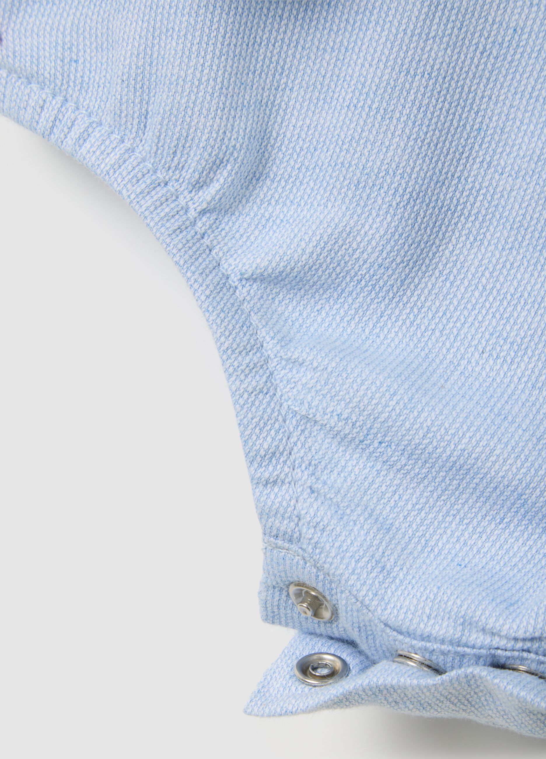 Newborn baby bodysuit in pure blue cotton