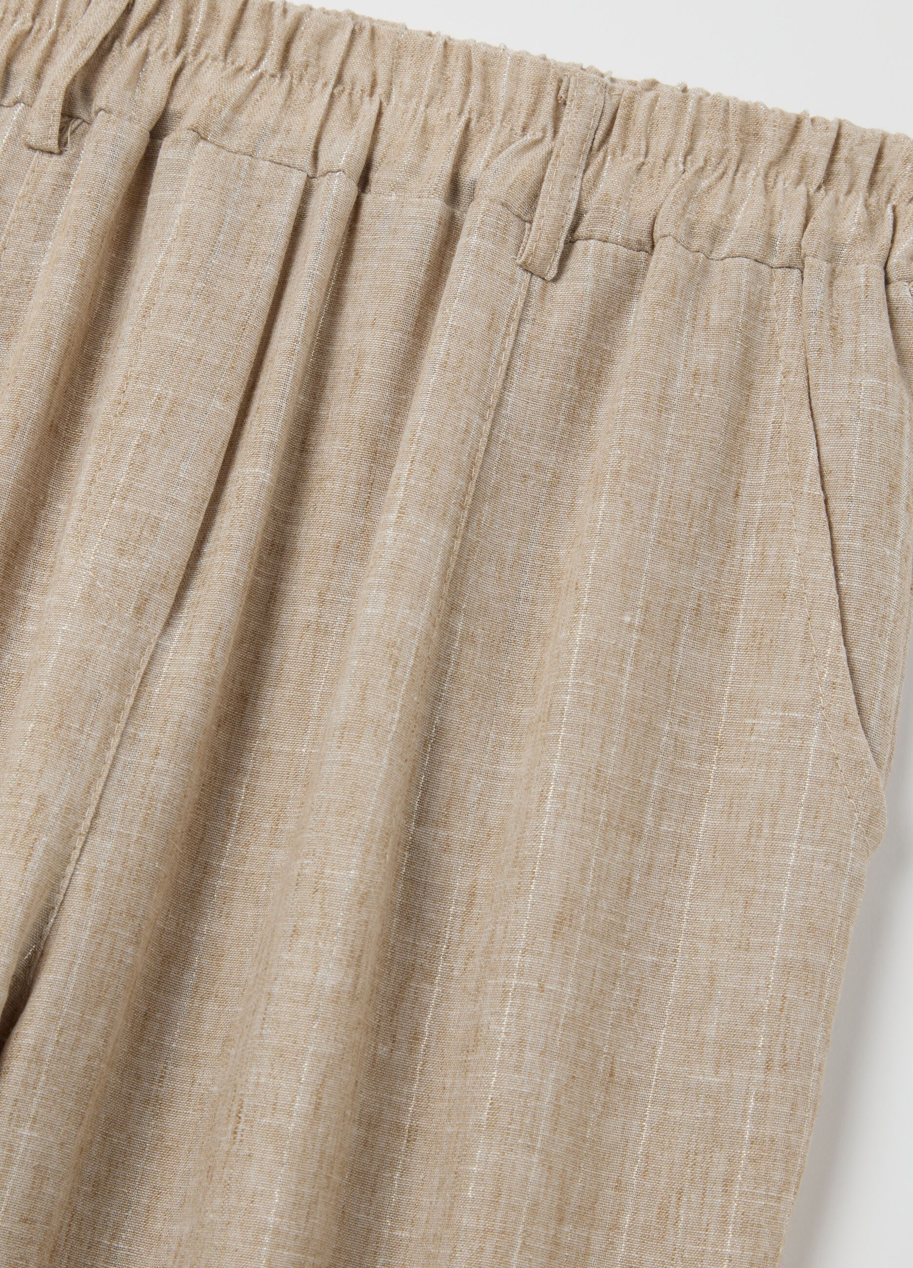 Beige trousers in stretch fabric