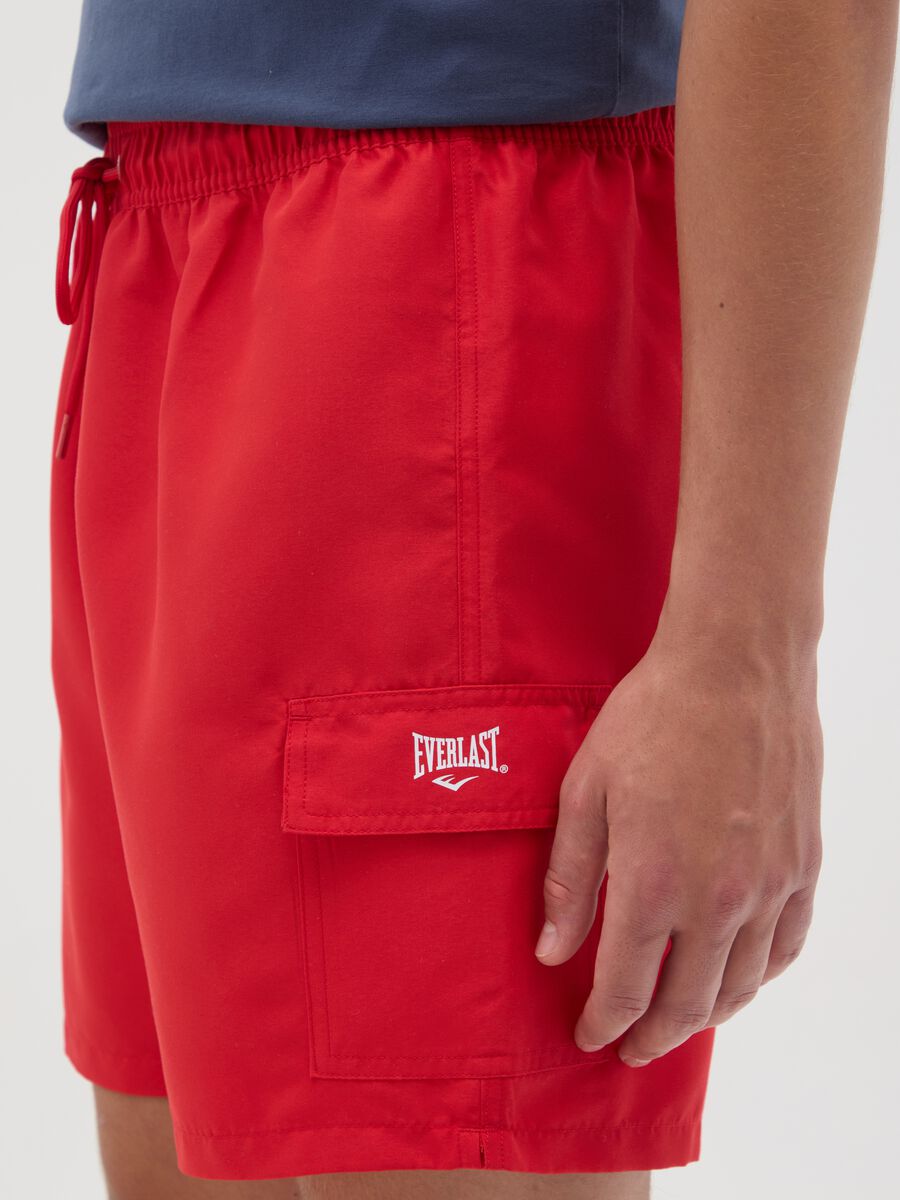 Red swimming trunks with logo print_2