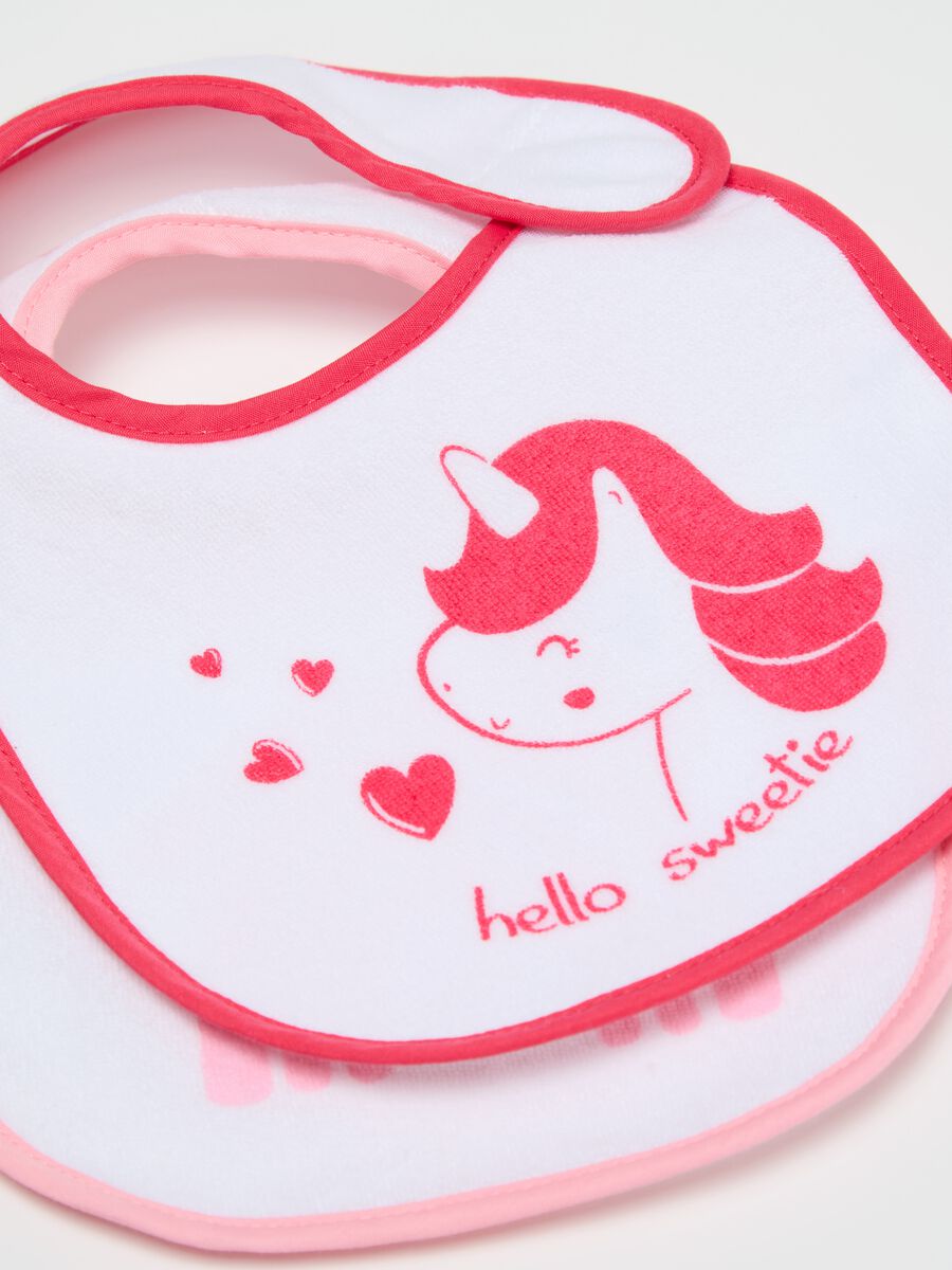 Three-pack bibs with PEVA backing and dinosaur print_1