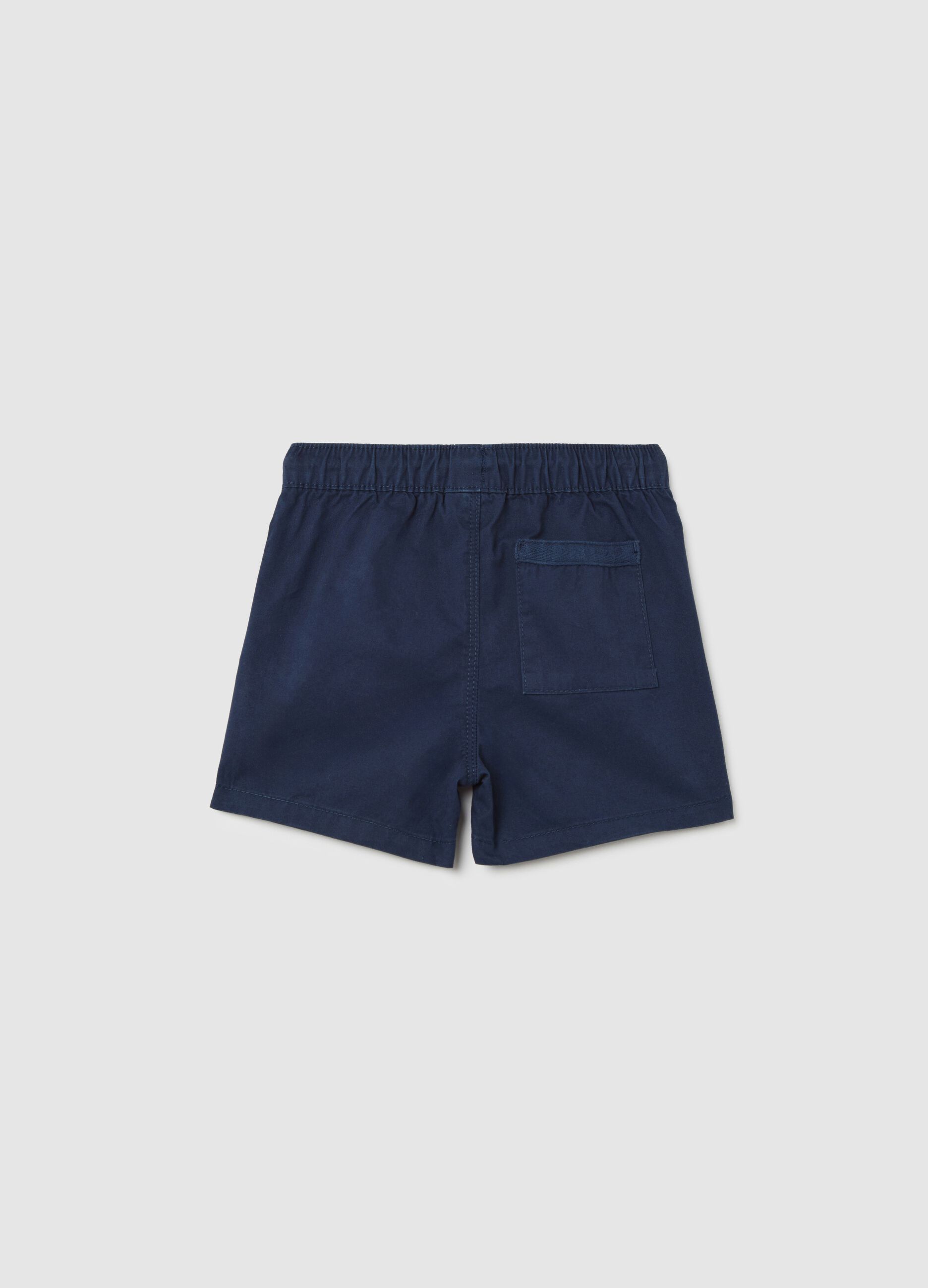 Boys’ shorts in 100% blue cotton with regular fit and elasticated waist