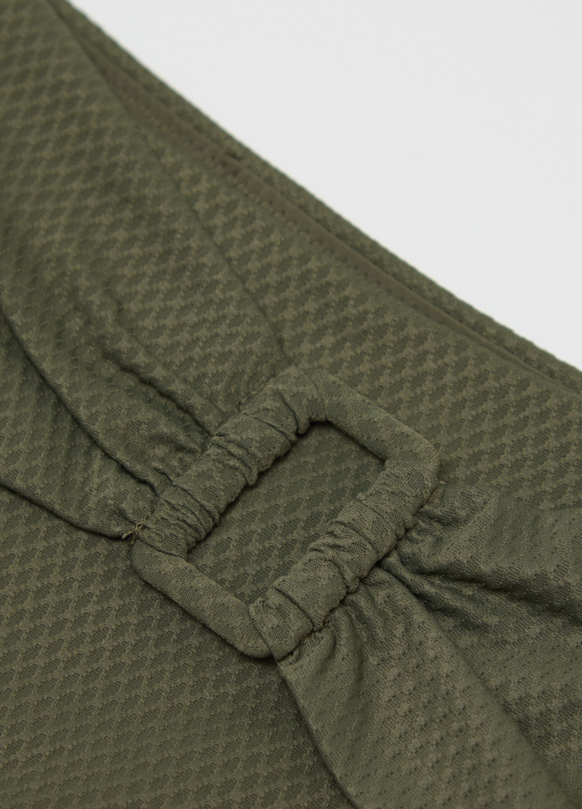 Green high-rise bikini briefs with buckle