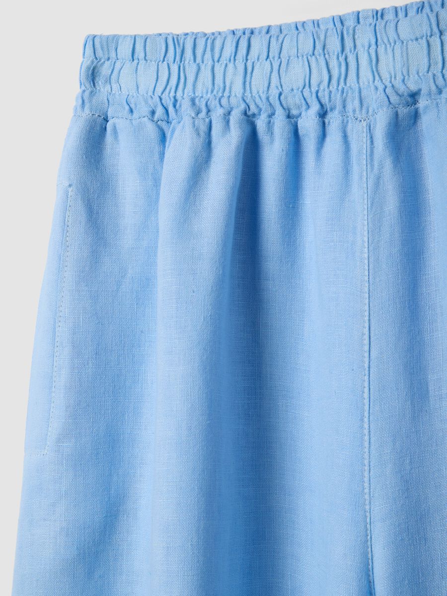 Pantaloni azzurri in puro lino a gamba ampia regular fit_5