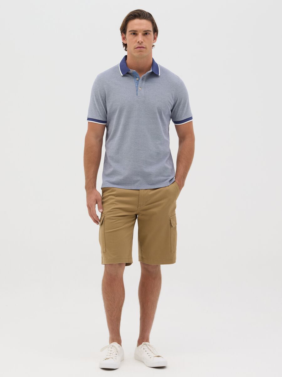 Blue polo shirt with short sleeves in cotton piquet_1