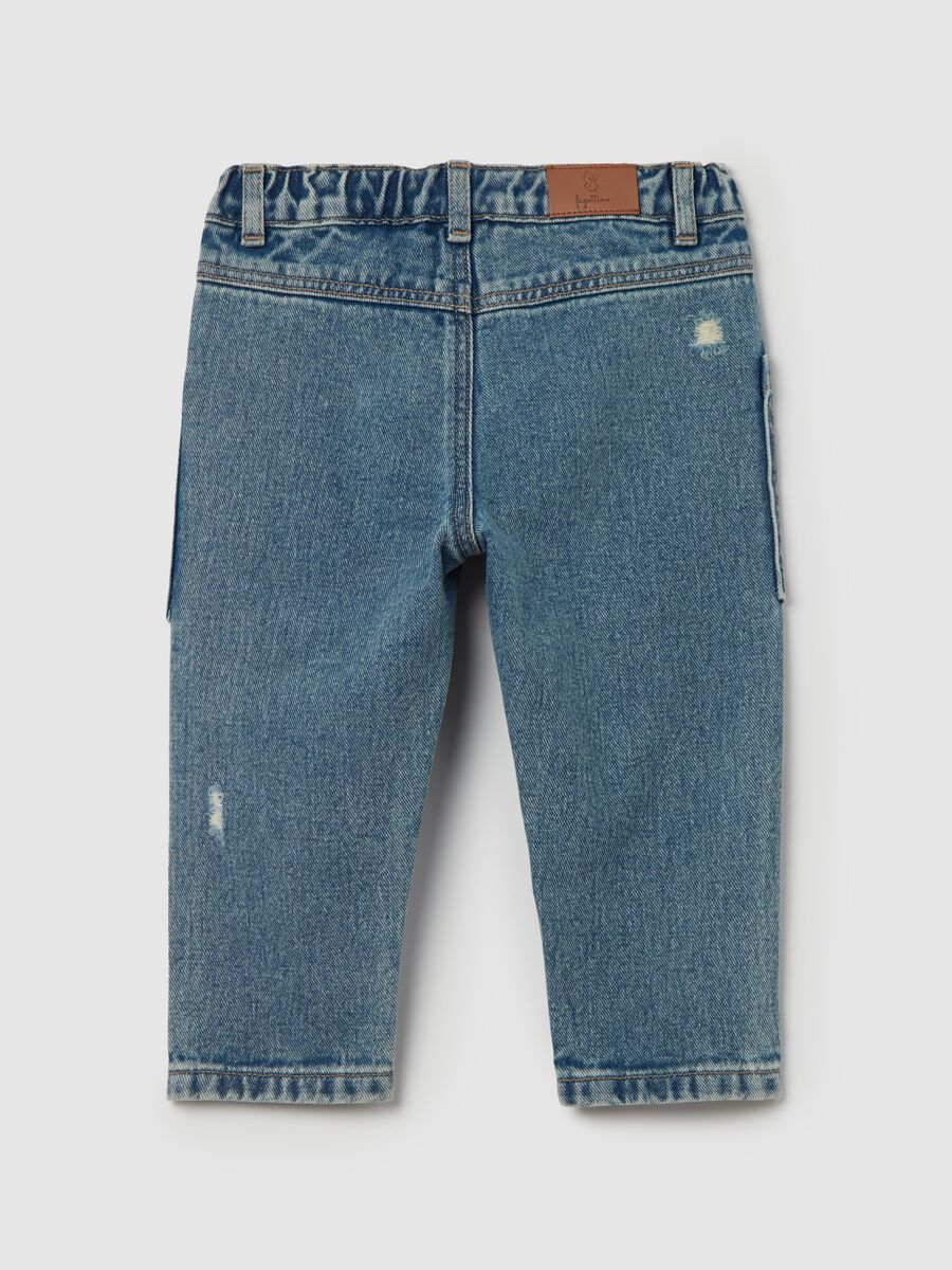 Jeans in cotone con abrasioni_1