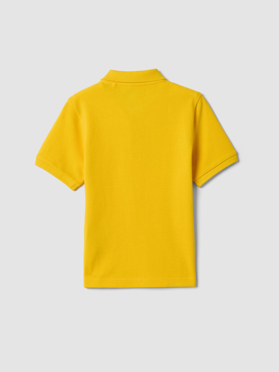Polo a maniche corte gialla in puro cotone organico da bambino_1