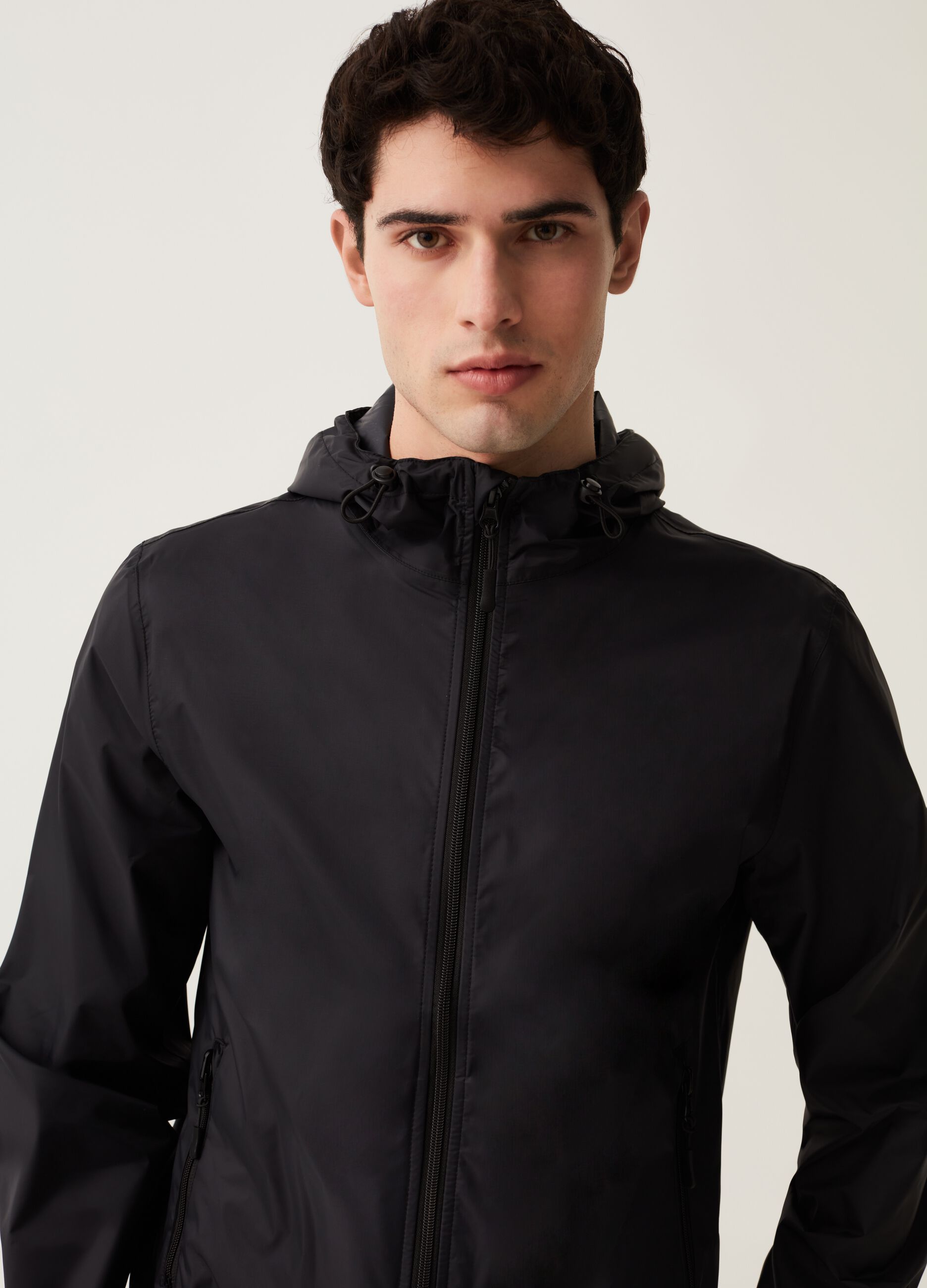 Short waterproof jacket with hood