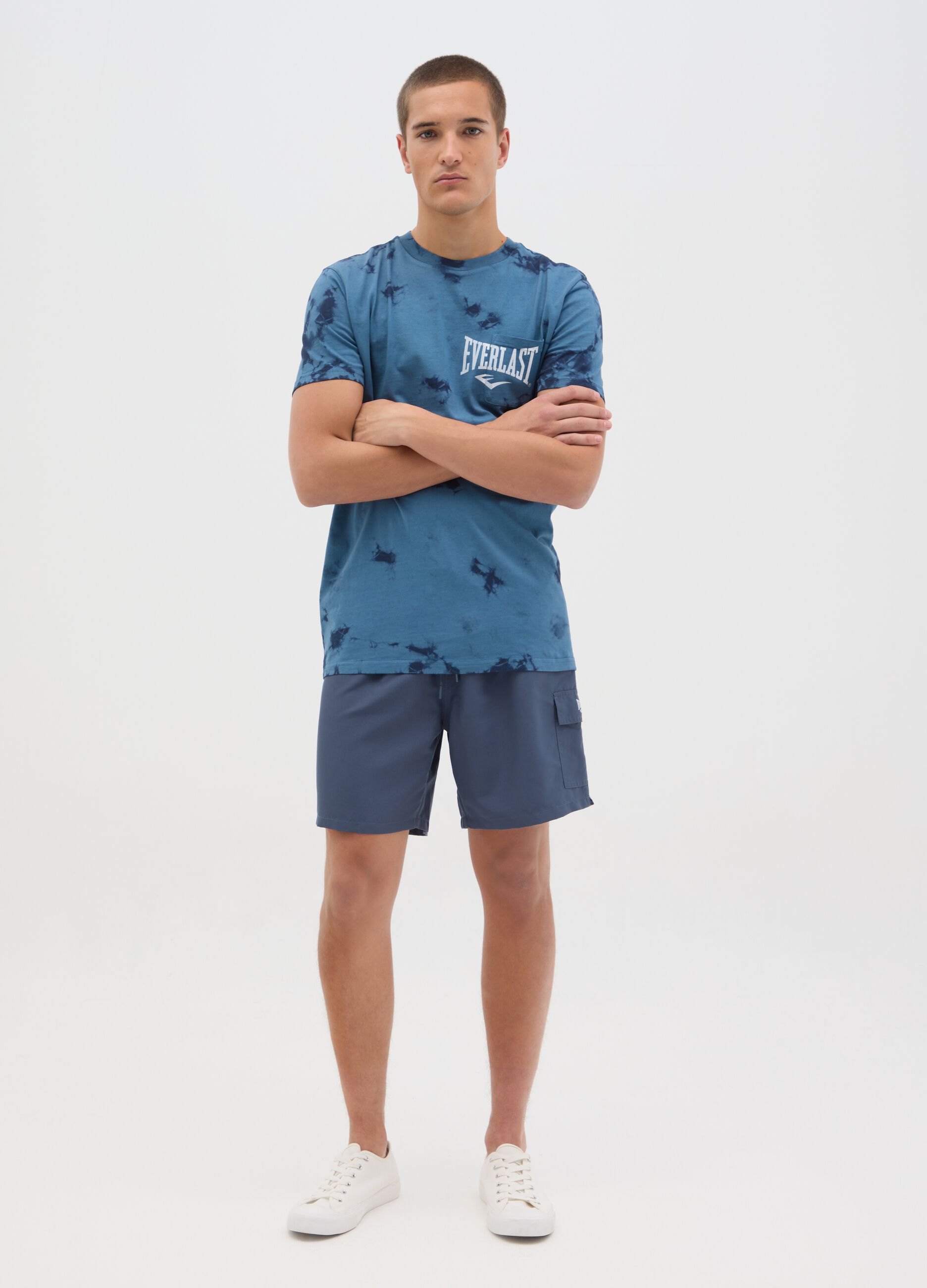 Blue swimming trunks with logo print