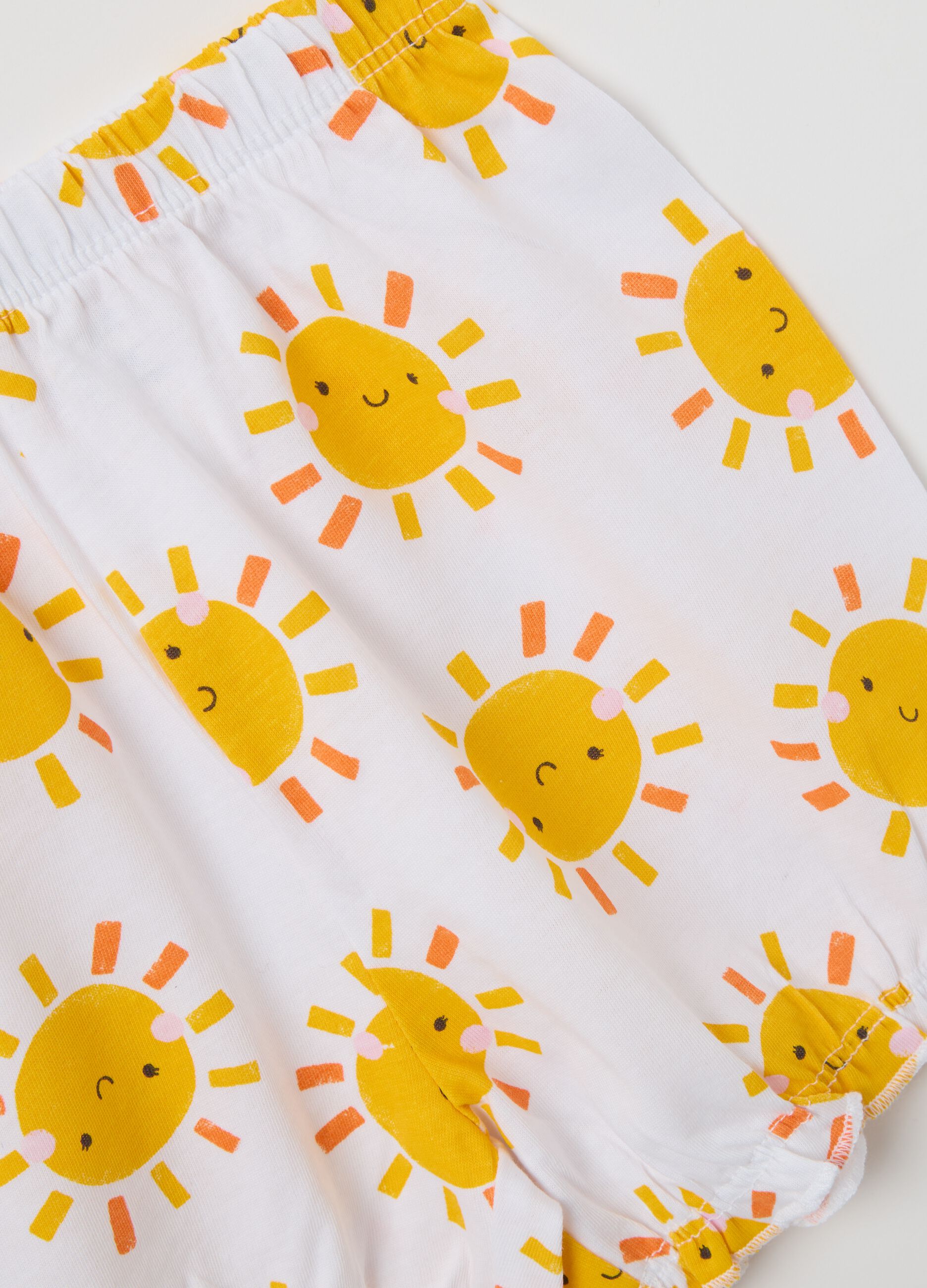 White pyjamas in cotton with sun print