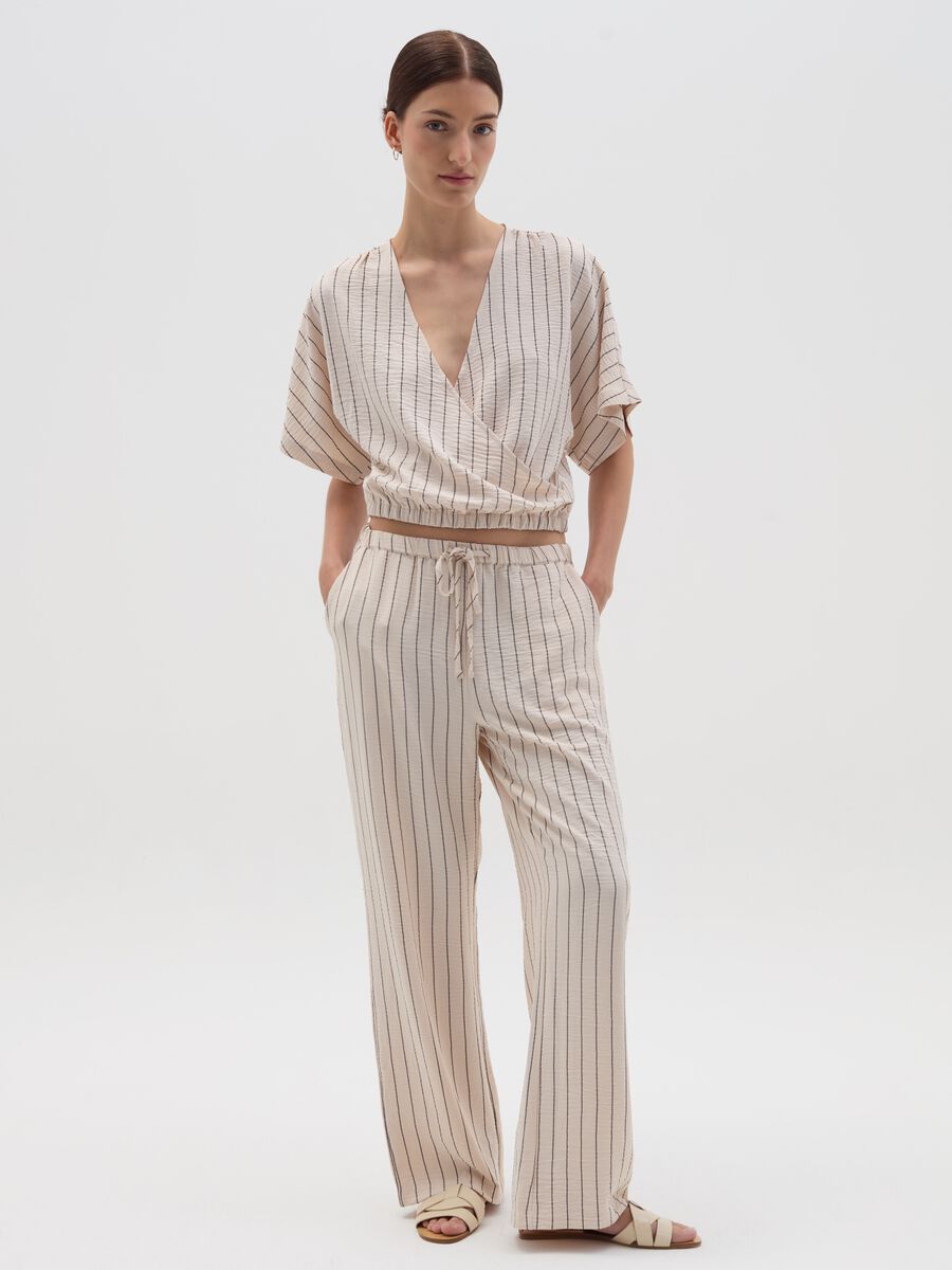 Short crossover beige shirt with stripes_1