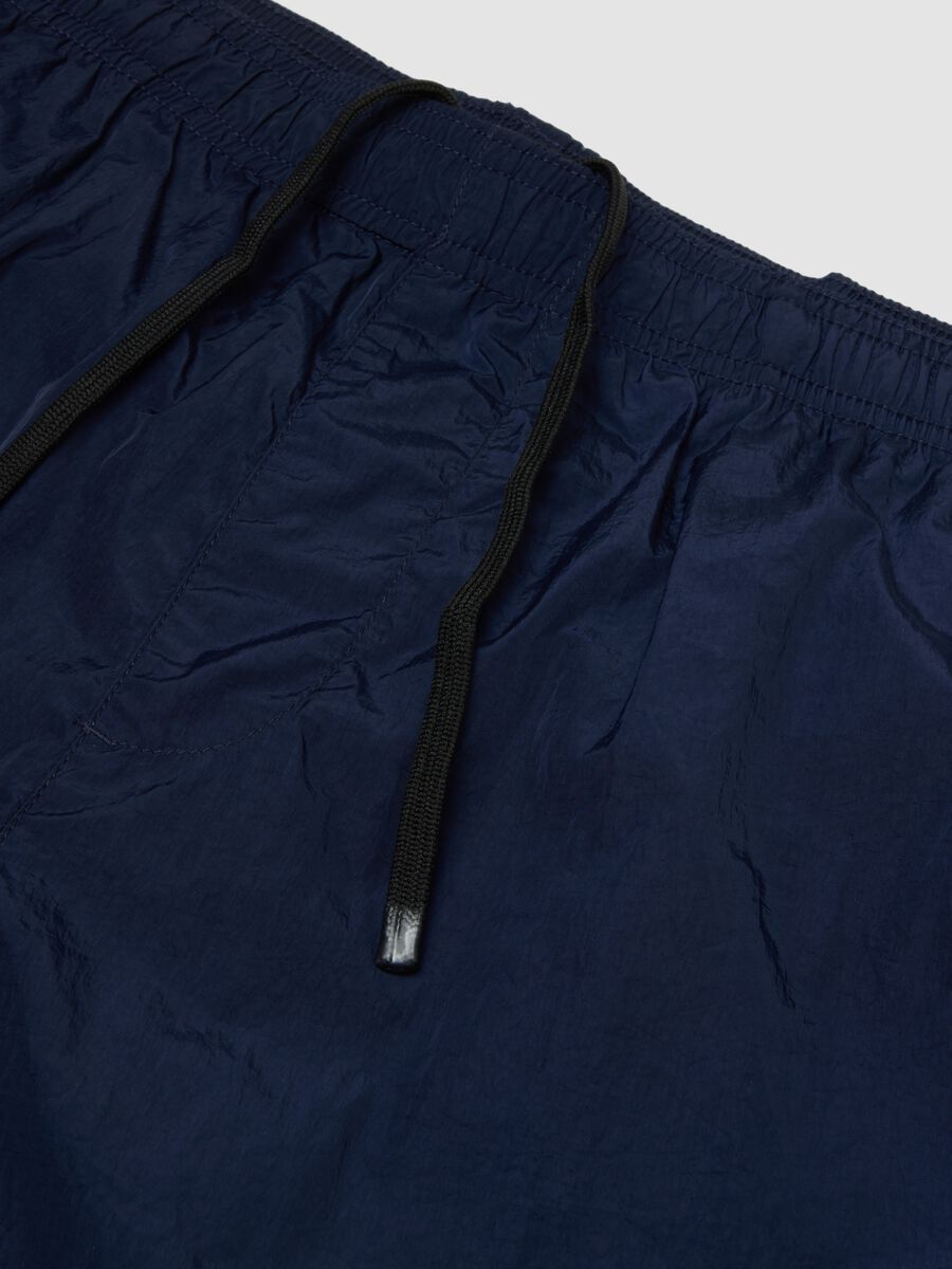 Blue swim shorts with elasticated waistband_1