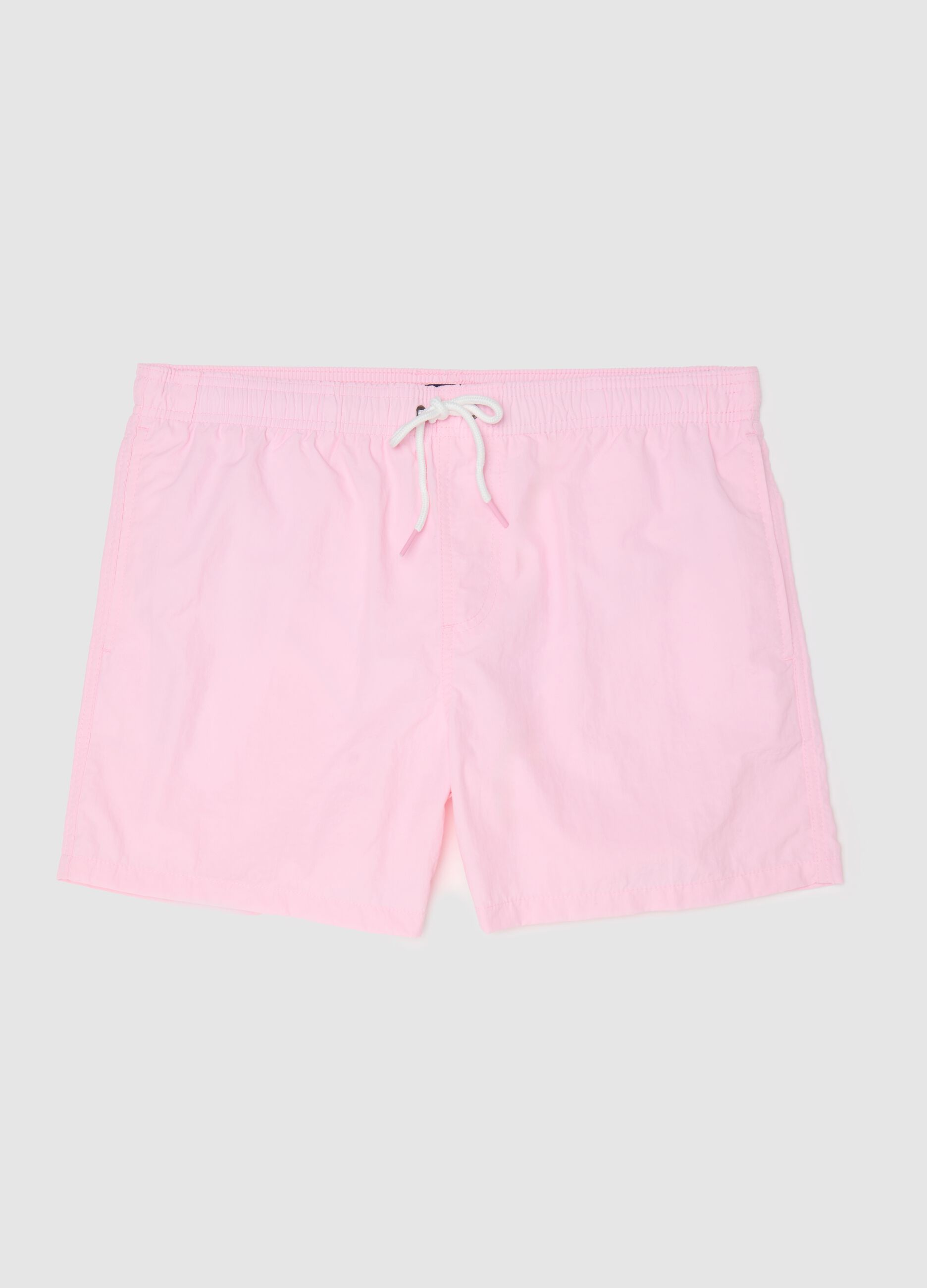 Pink swim trunks in mixed materials