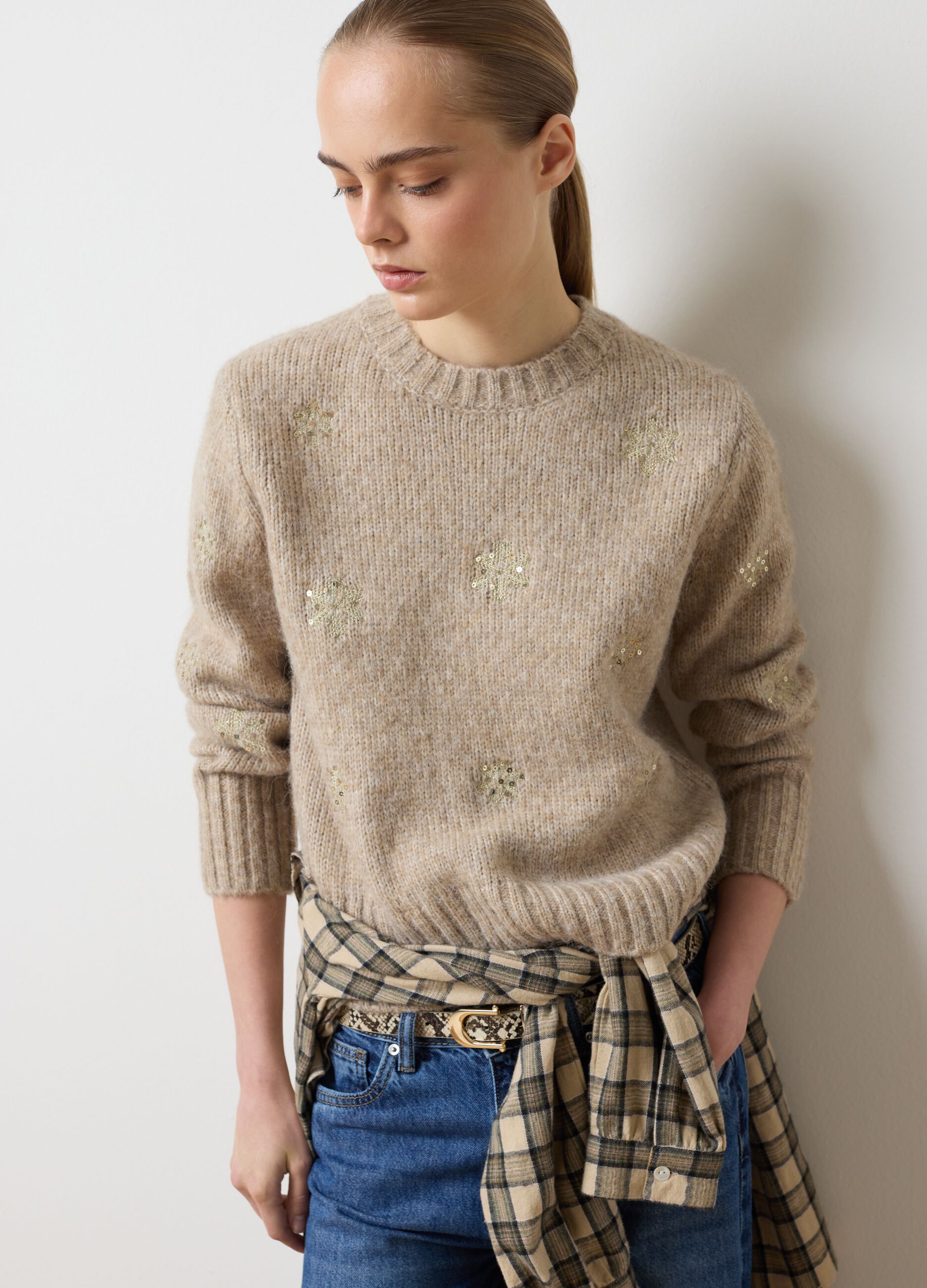 Beige oversized fit sweater with decorations