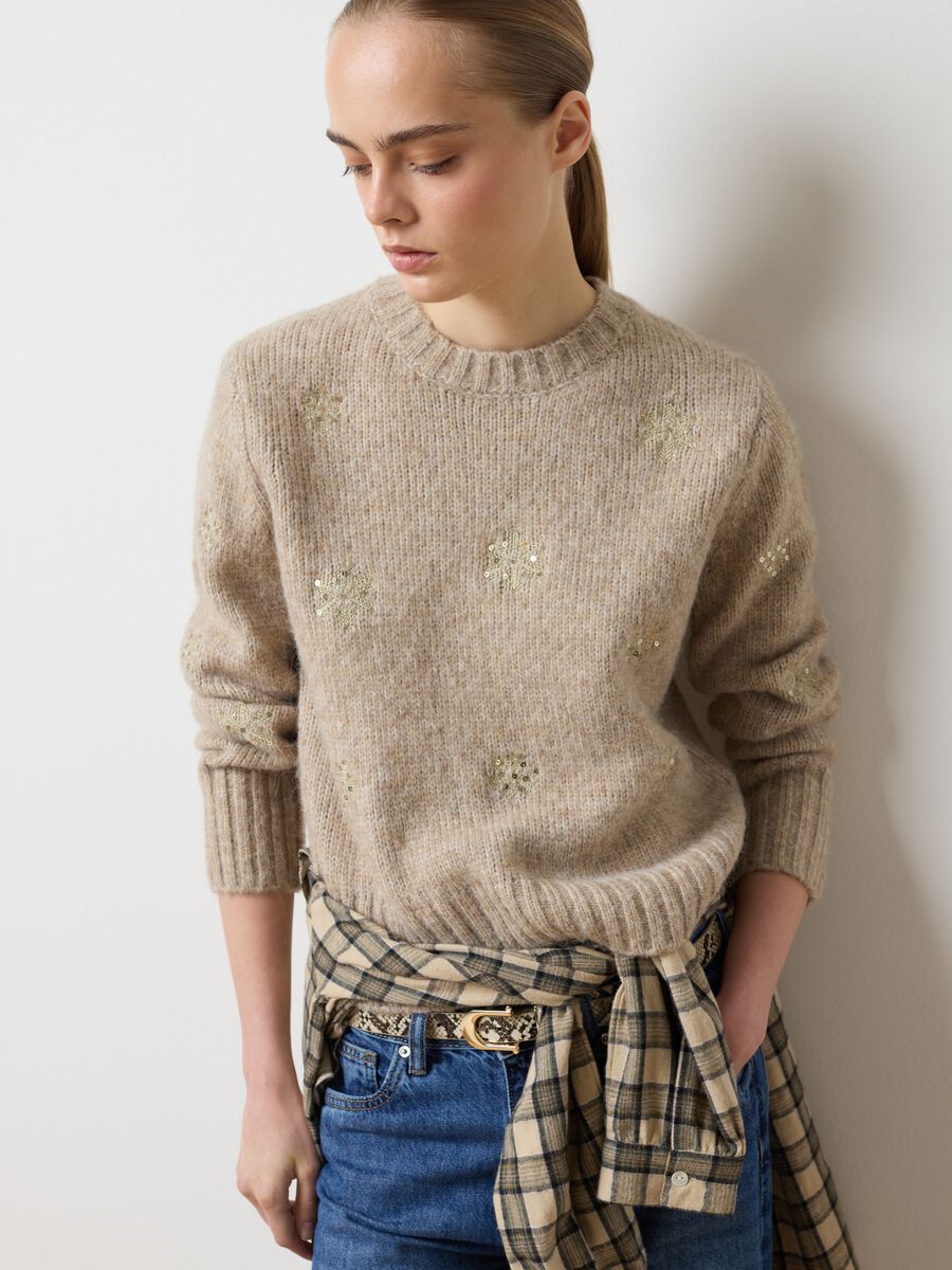 Beige oversized fit sweater with decorations_0