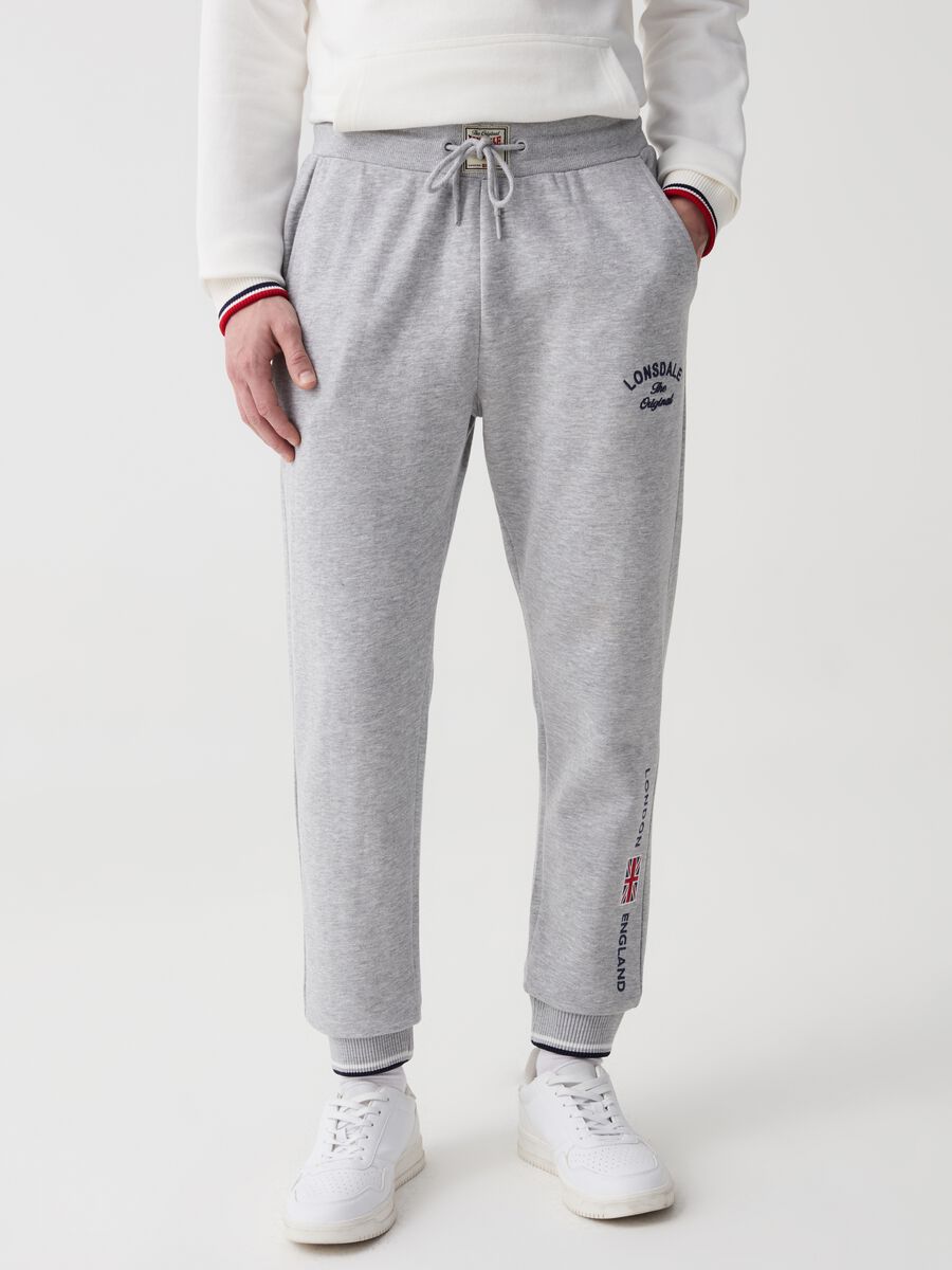 Fleece joggers with drawstring and embroidered logo_1