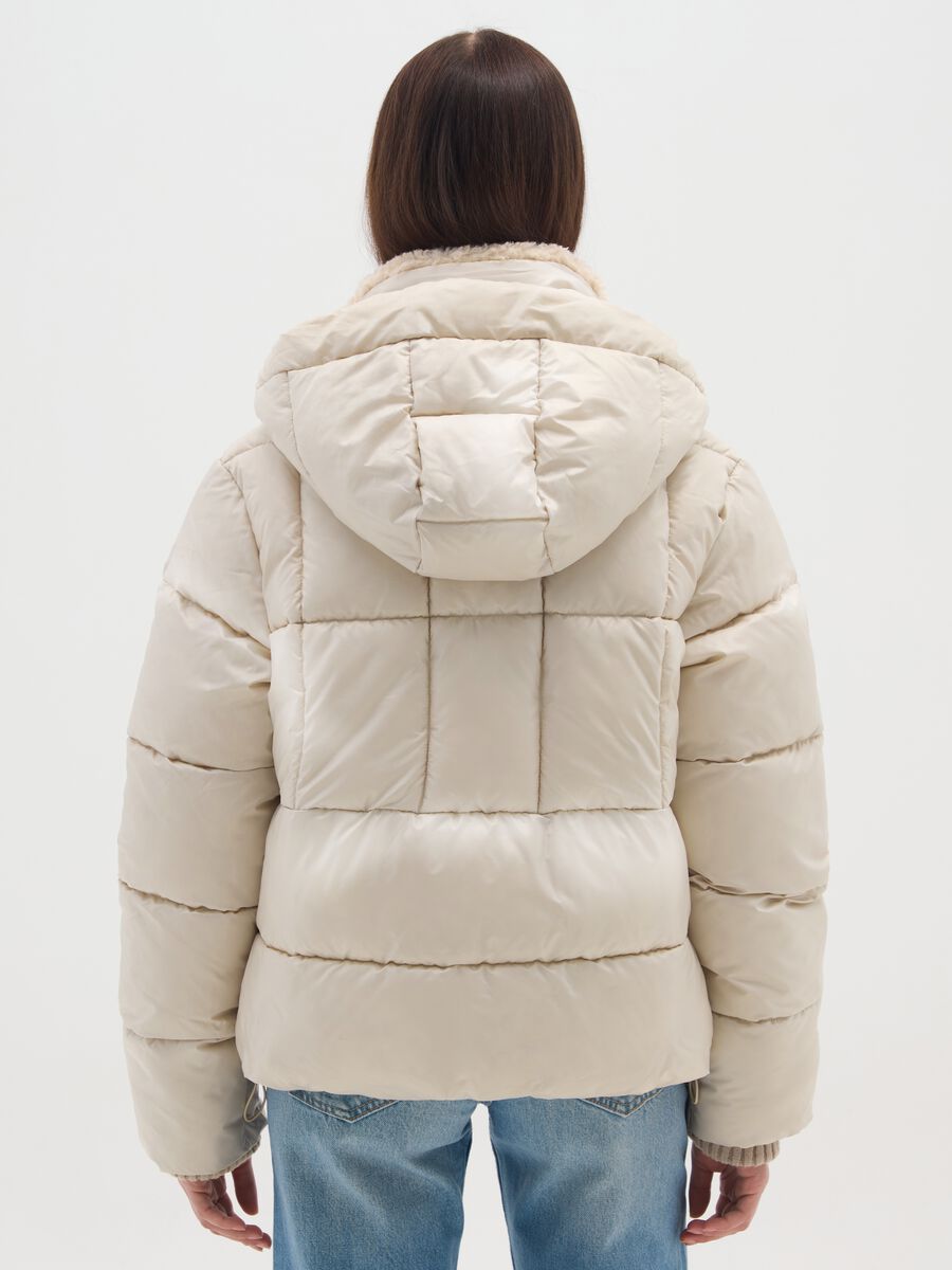 The Iconic Puffer light beige jacket with hood and sherpa details_3
