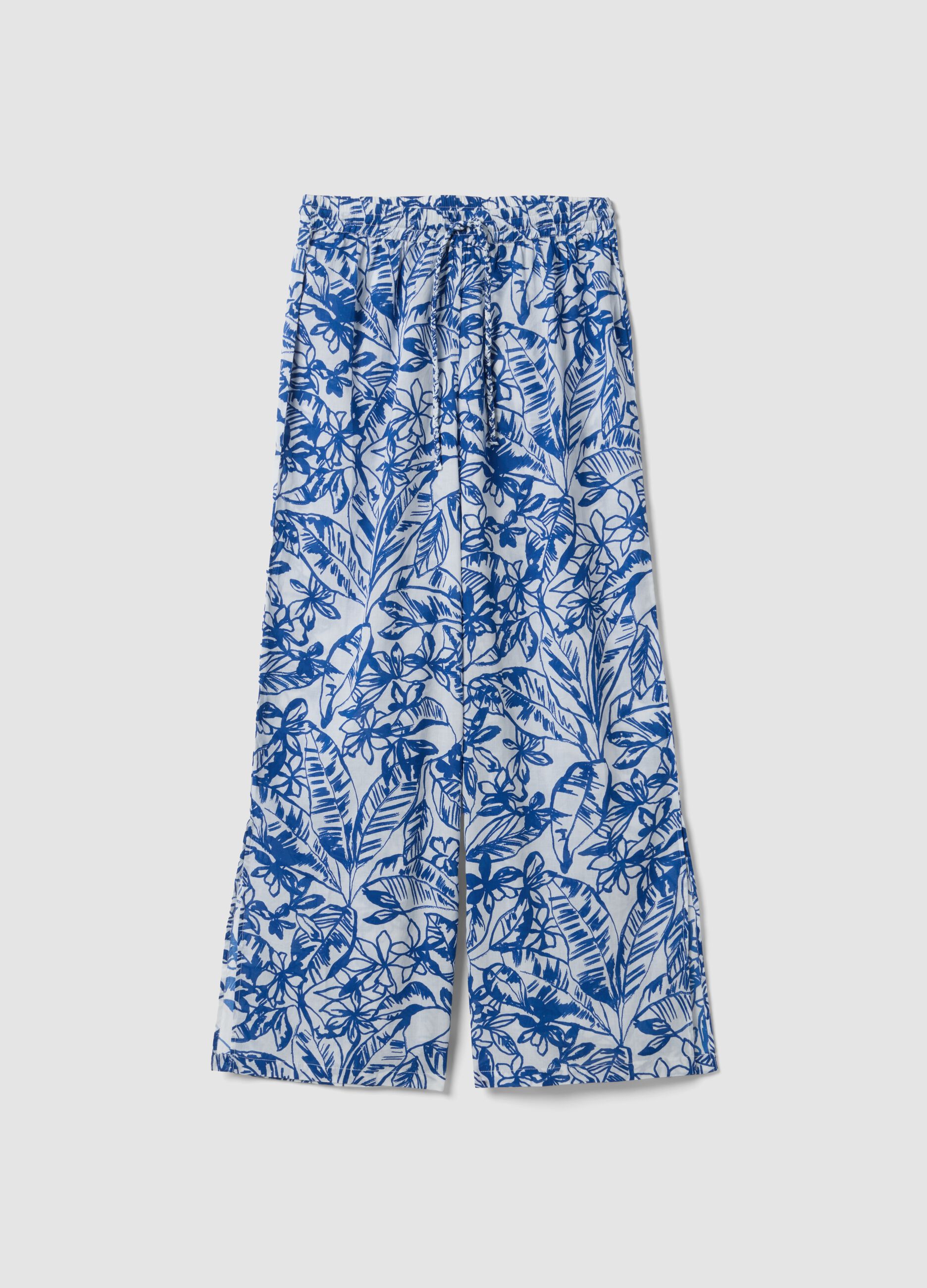 Pantaloni blu e bianchi in cotone organico con stampa floreale