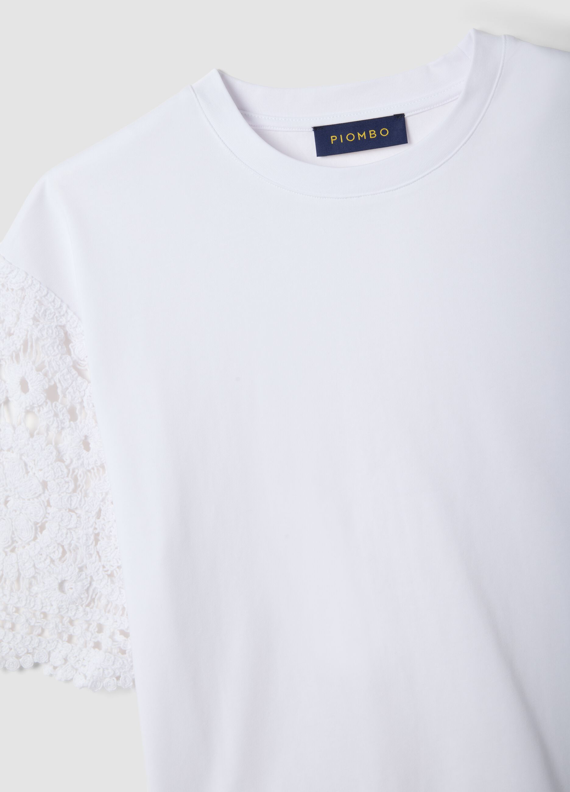 White short-sleeve cotton-blend T-shirt with mesh details