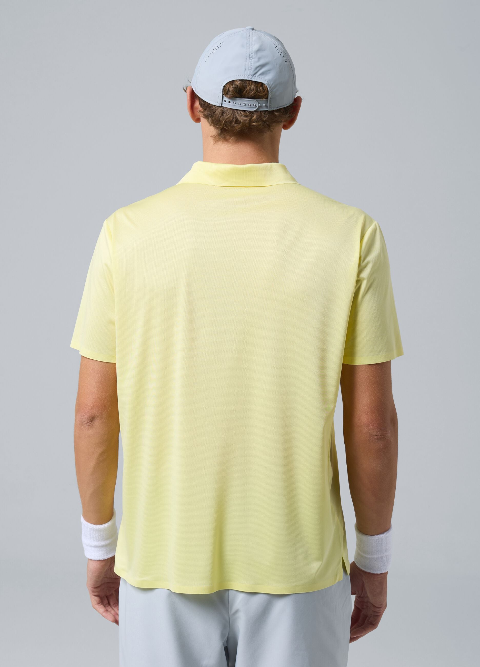 Yellow ALTAVIA COURT stretch performance polo