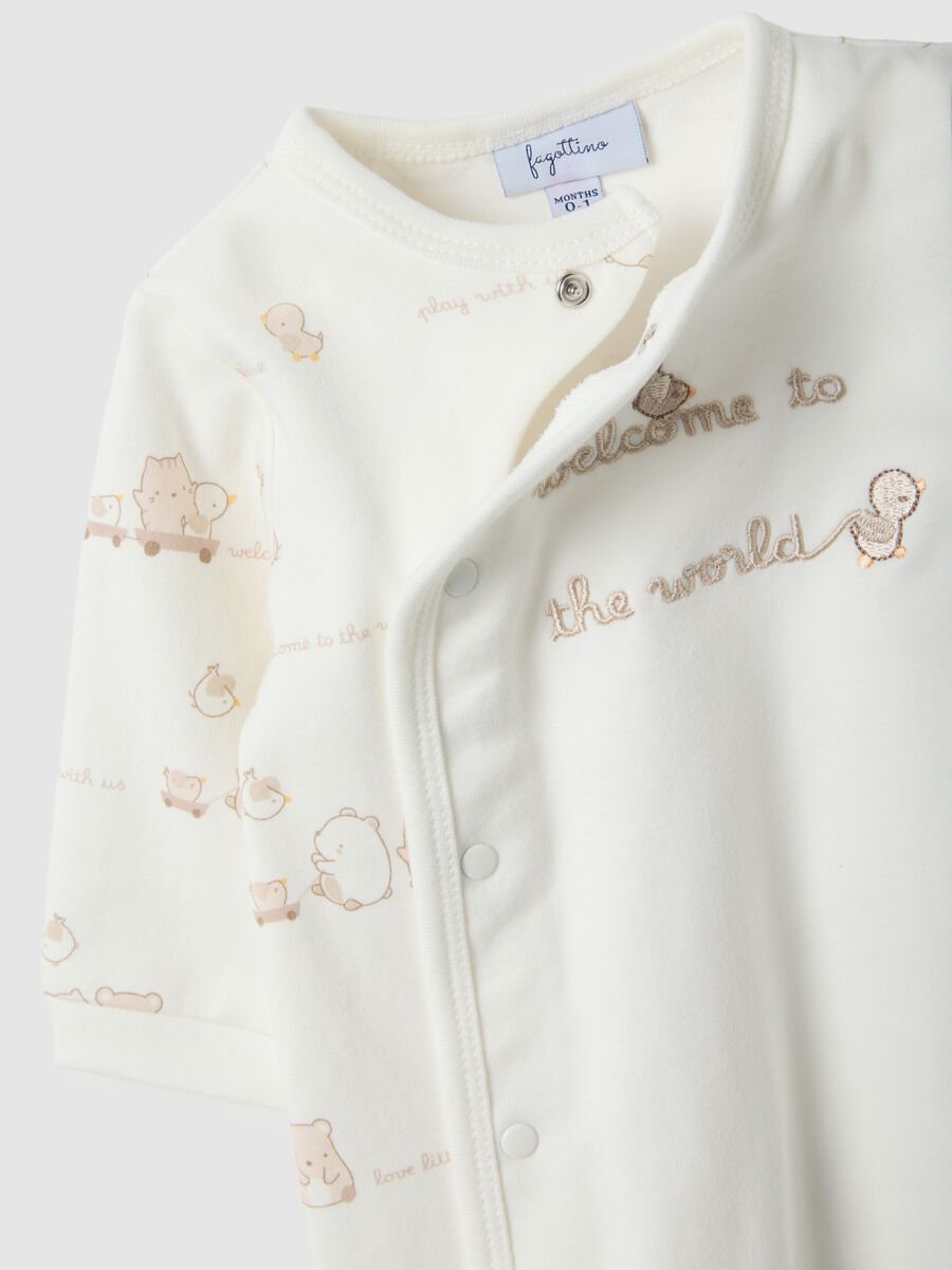 White newborn romper in pure cotton with long sleeves and embroidery_2