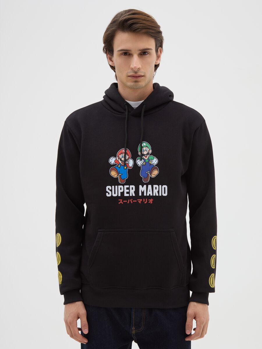 Felpa in misto cotone nera con cappuccio e stampa_0