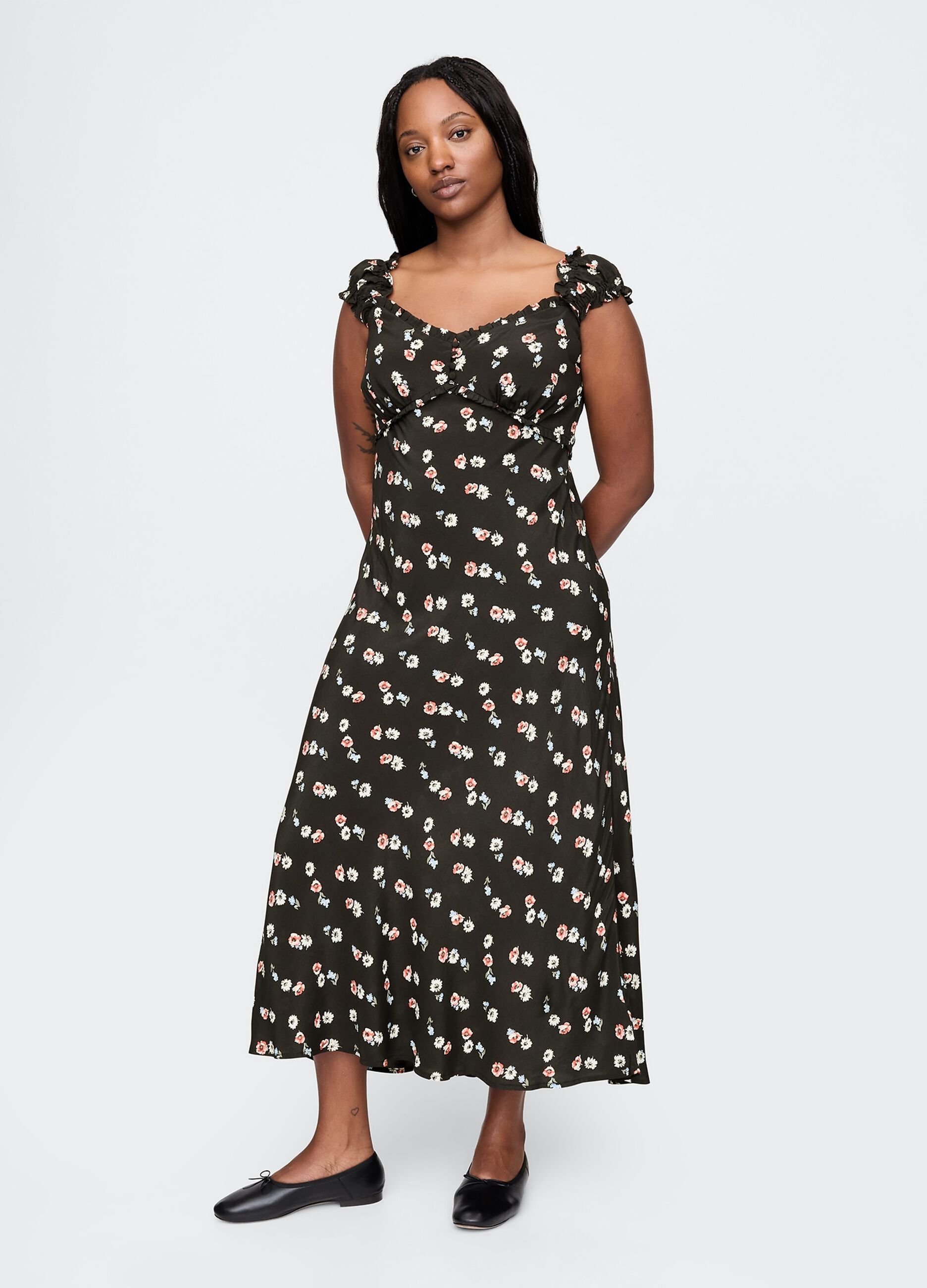 Sleeveless dress with floral pattern
