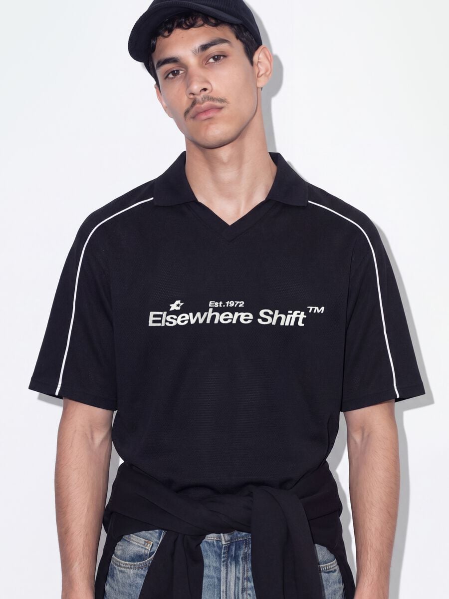 Polo nera in puro cotone over fit a maniche corte over fit_3