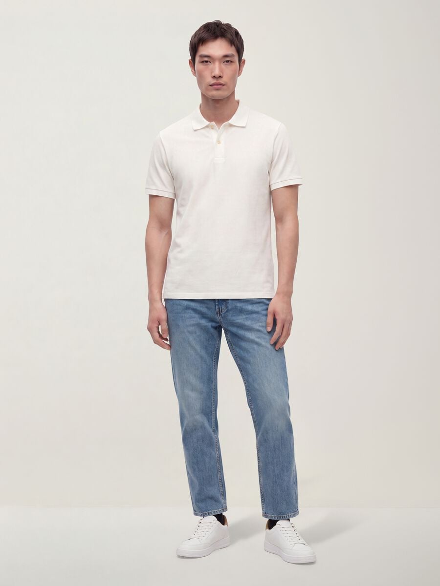 Polo bianca in puro cotone piquet con colletto classico regular fit_1