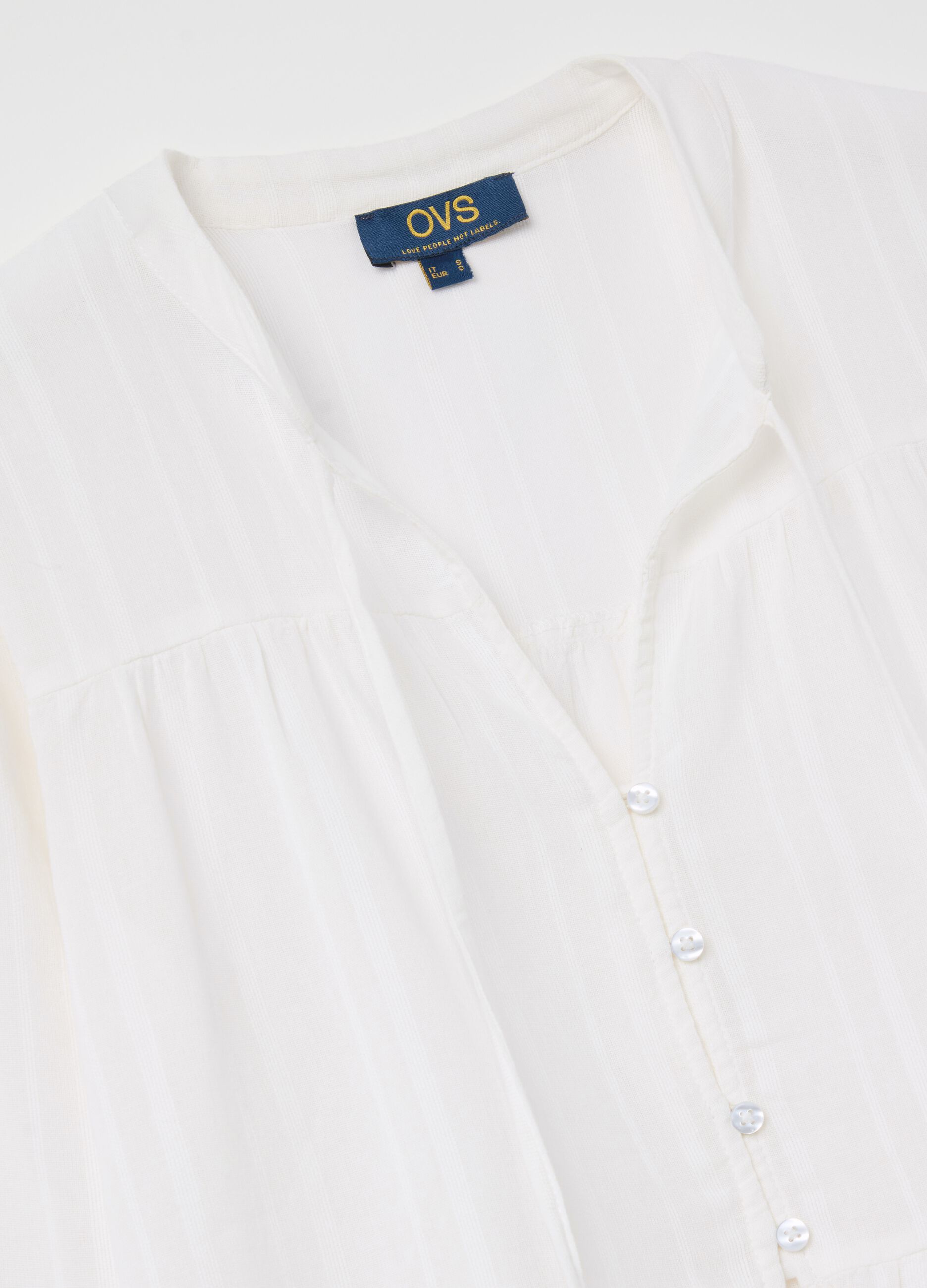 Blouse with laces and striped motif