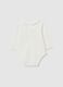 White newborn baby bodysuit in pure cotton with ruffle collar_1