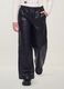 Pantaloni neri wide leg con vita elasticizzata per bambina_1