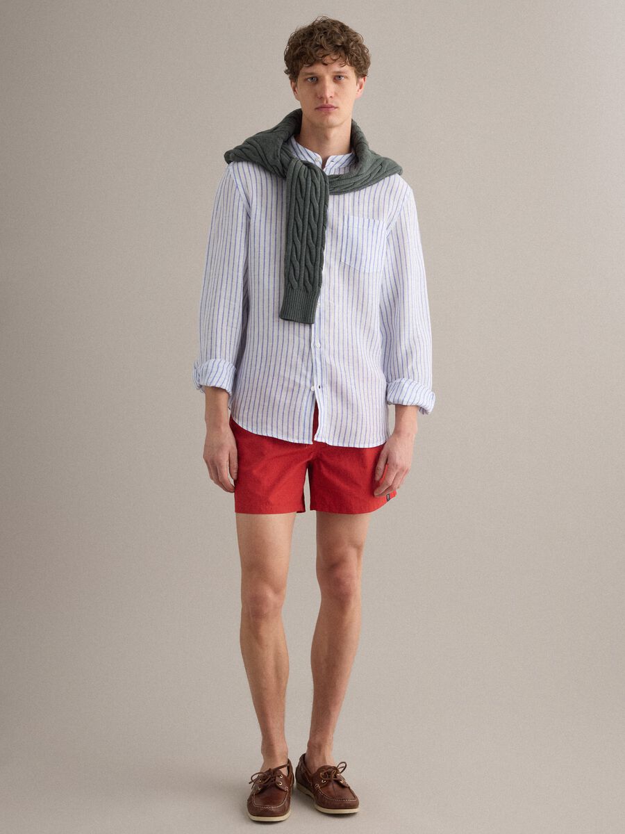 Red swim shorts with elasticated waistband and drawstring_0