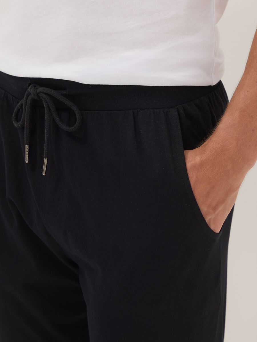 Pantaloni pigiama blu in cotone organico con vita elasticizzata_3