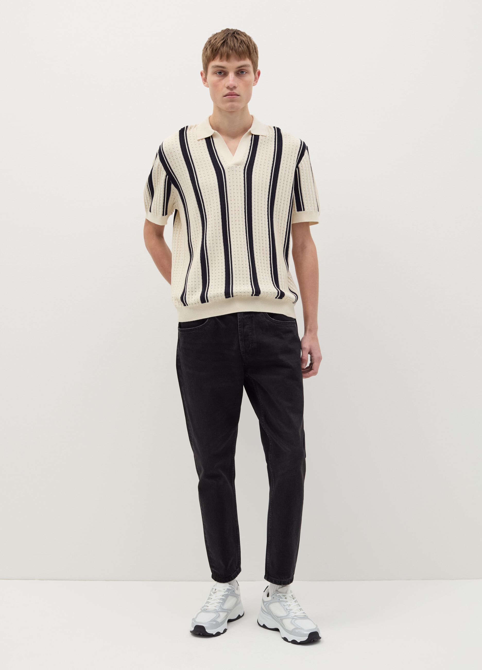 Maglia a righe con scollo a polo