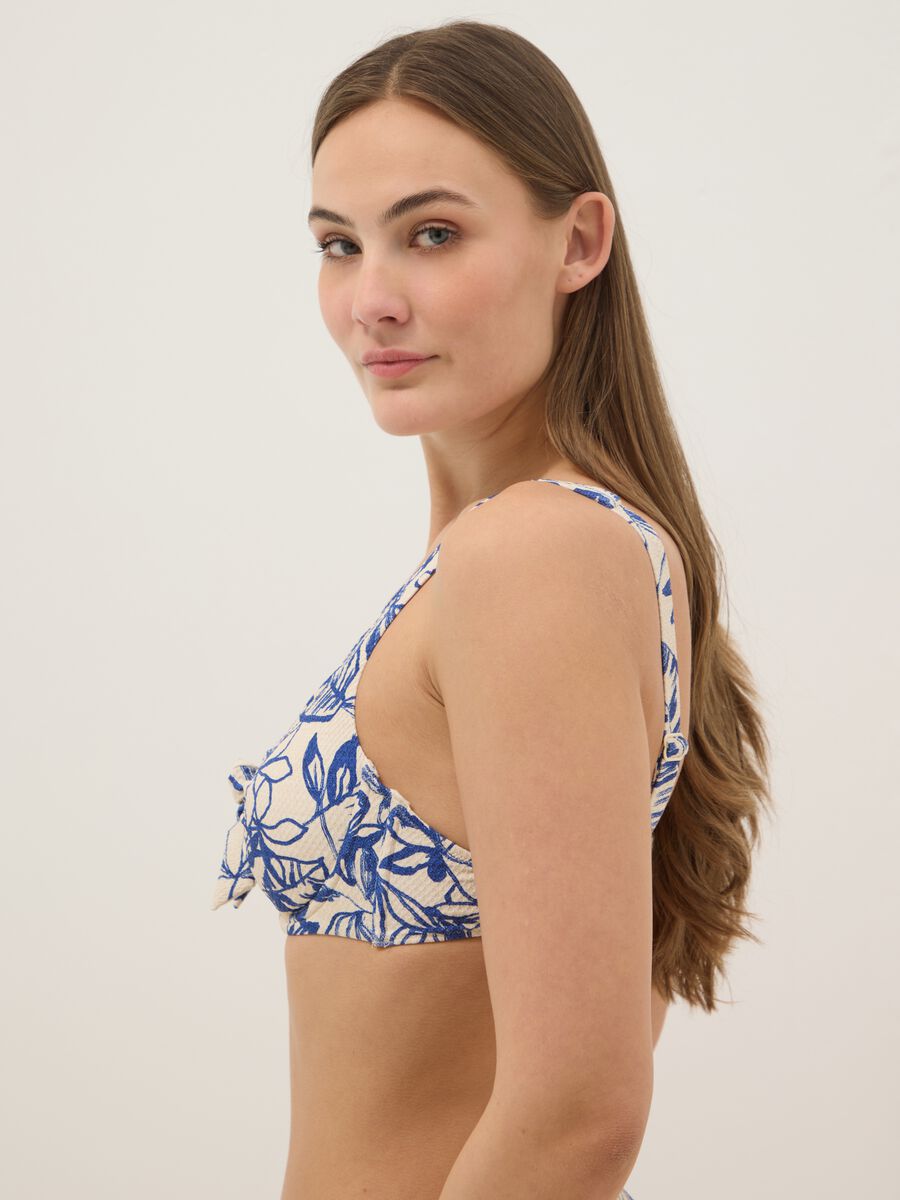 Top bikini blu in tessuto elasticizzato con stampa floreale_3