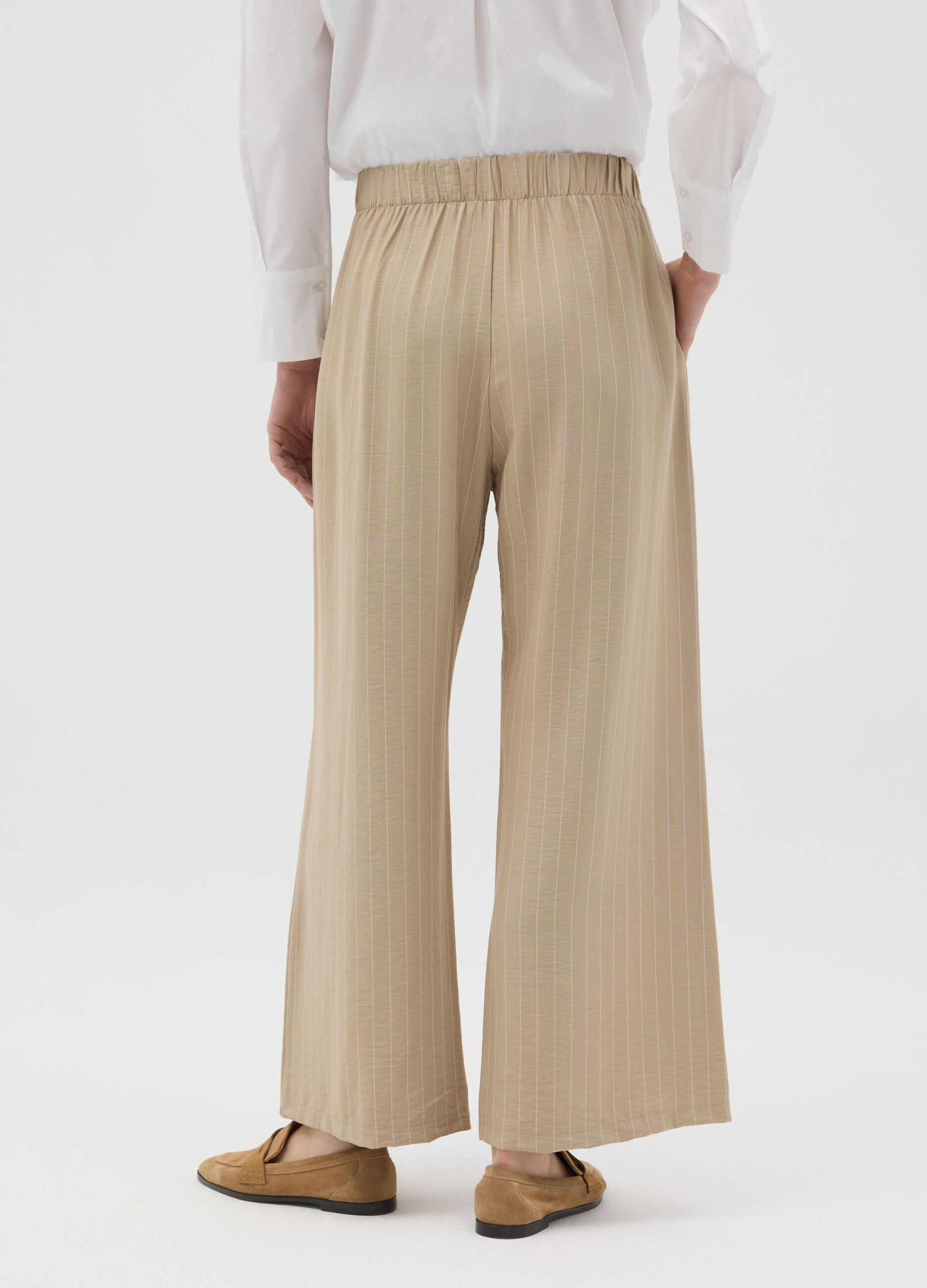 Beige palazzo trousers with striped pattern