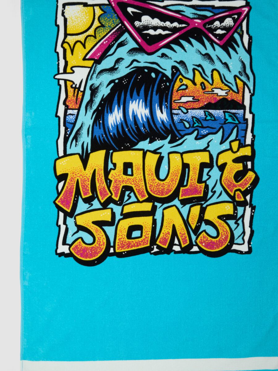 Telo mare azzurro in puro cotone con stampa onda_1