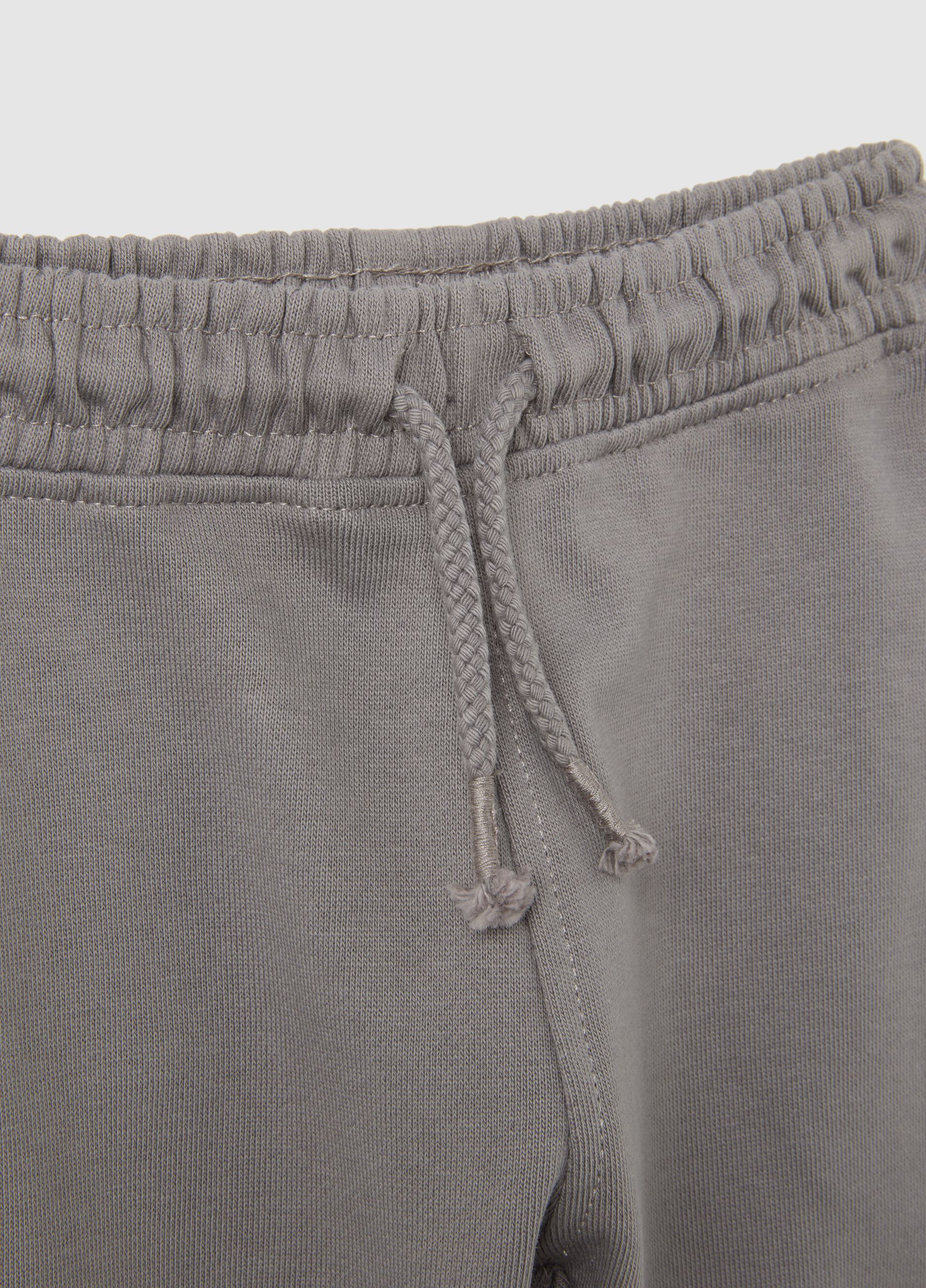 Baby trousers in pure grey cotton with regular fit